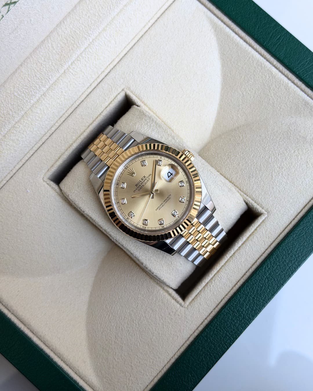 May be an image of wrist watch and text