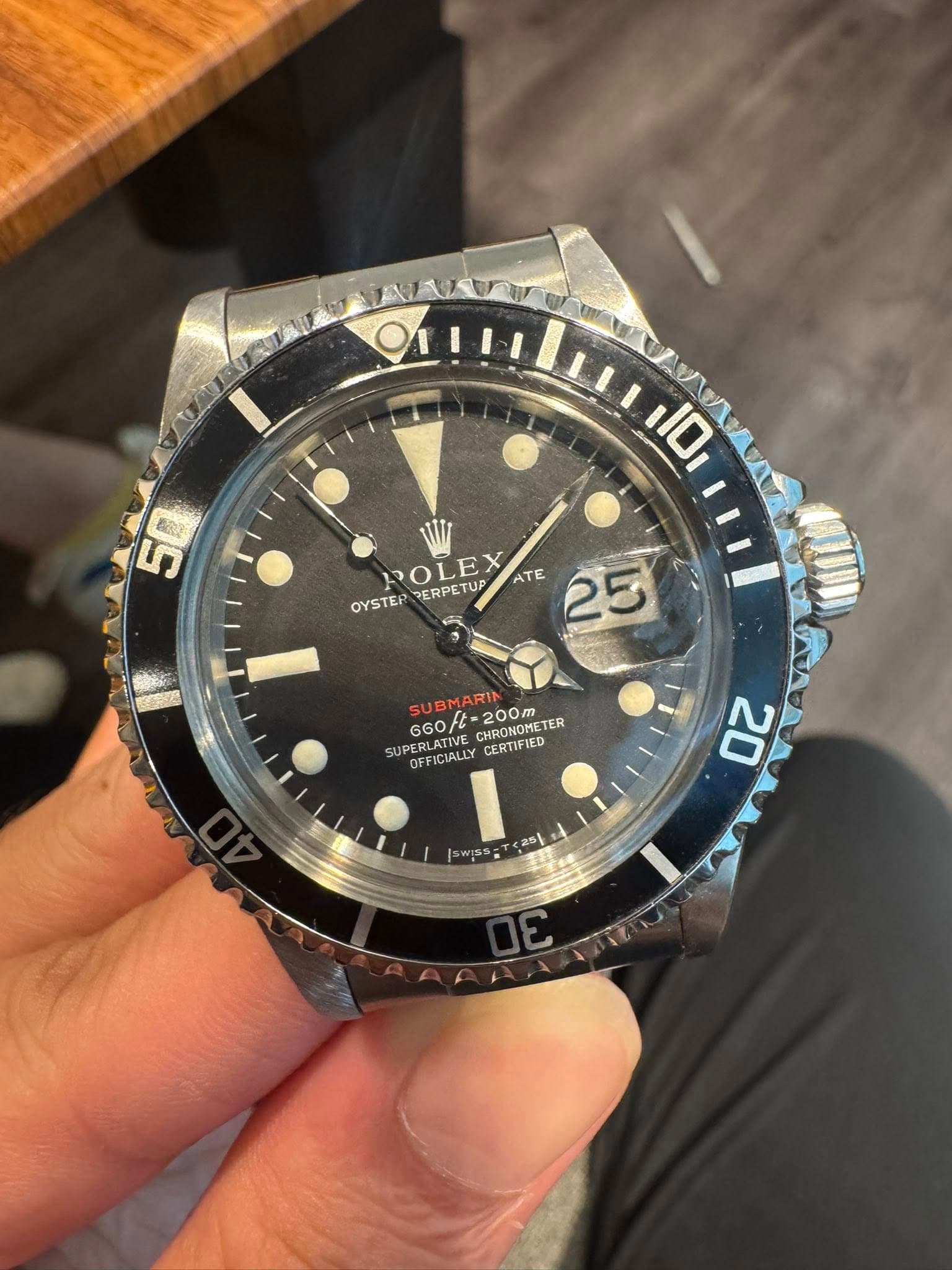 May be an image of wrist watch and text that says 'ΙΟι 50 ROLEX UP ATE 25 OYSTER ERPETUP 660t-200m BMARIN G60/t CHRONONES 200m CHRONOMETER UPERLATIVE RLATIVE OFFICIALLY CERTIFIED…