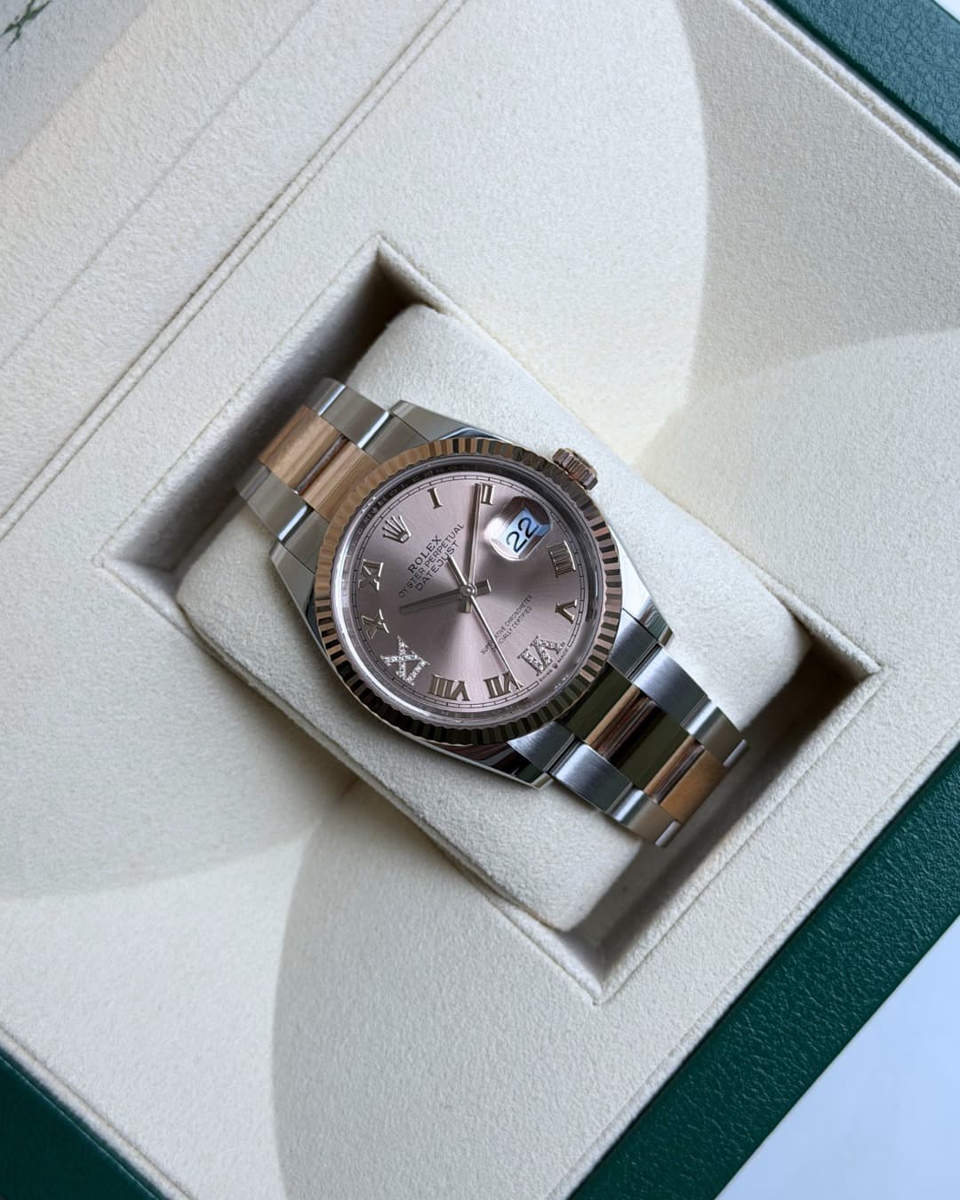 May be an image of wrist watch and text