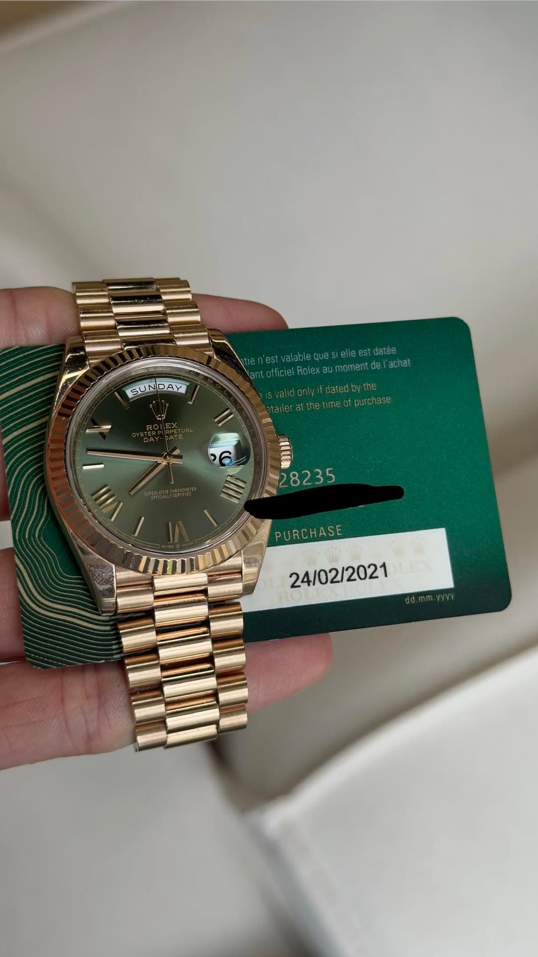May be an image of wrist watch and text