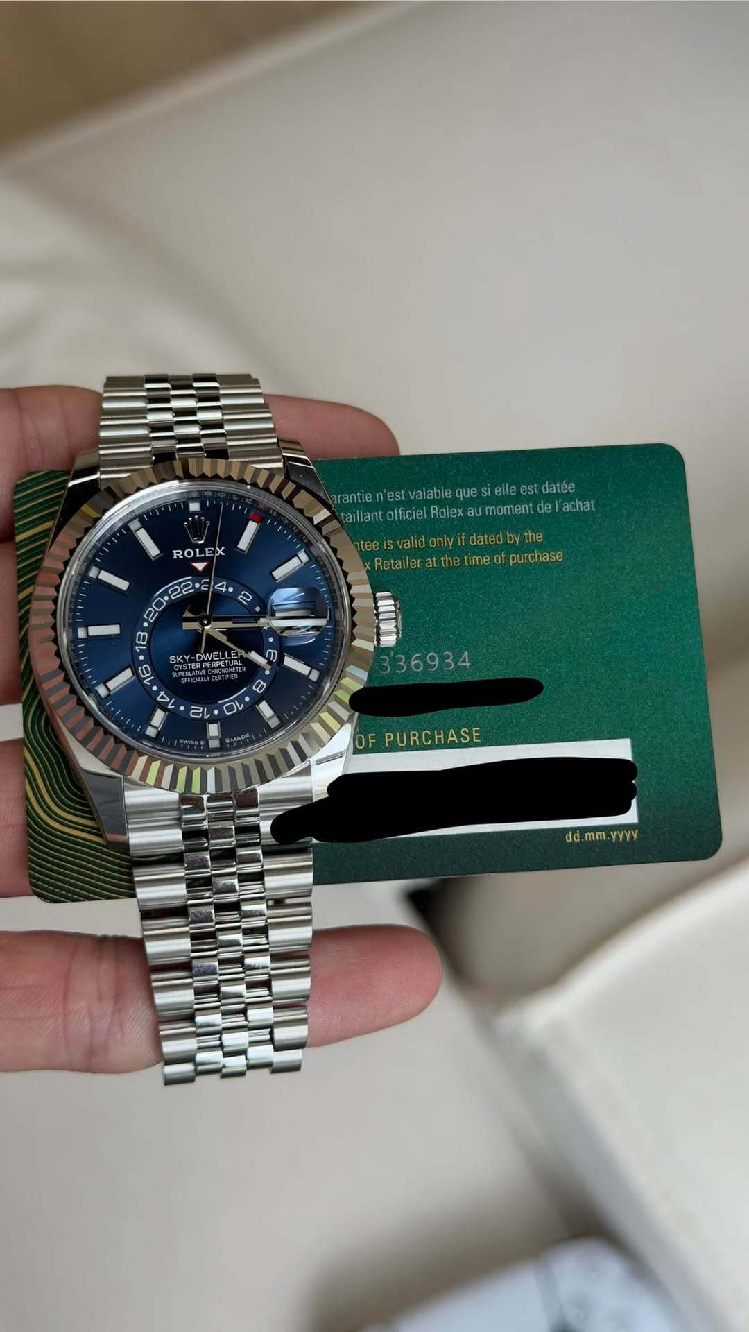 May be an image of wrist watch and text