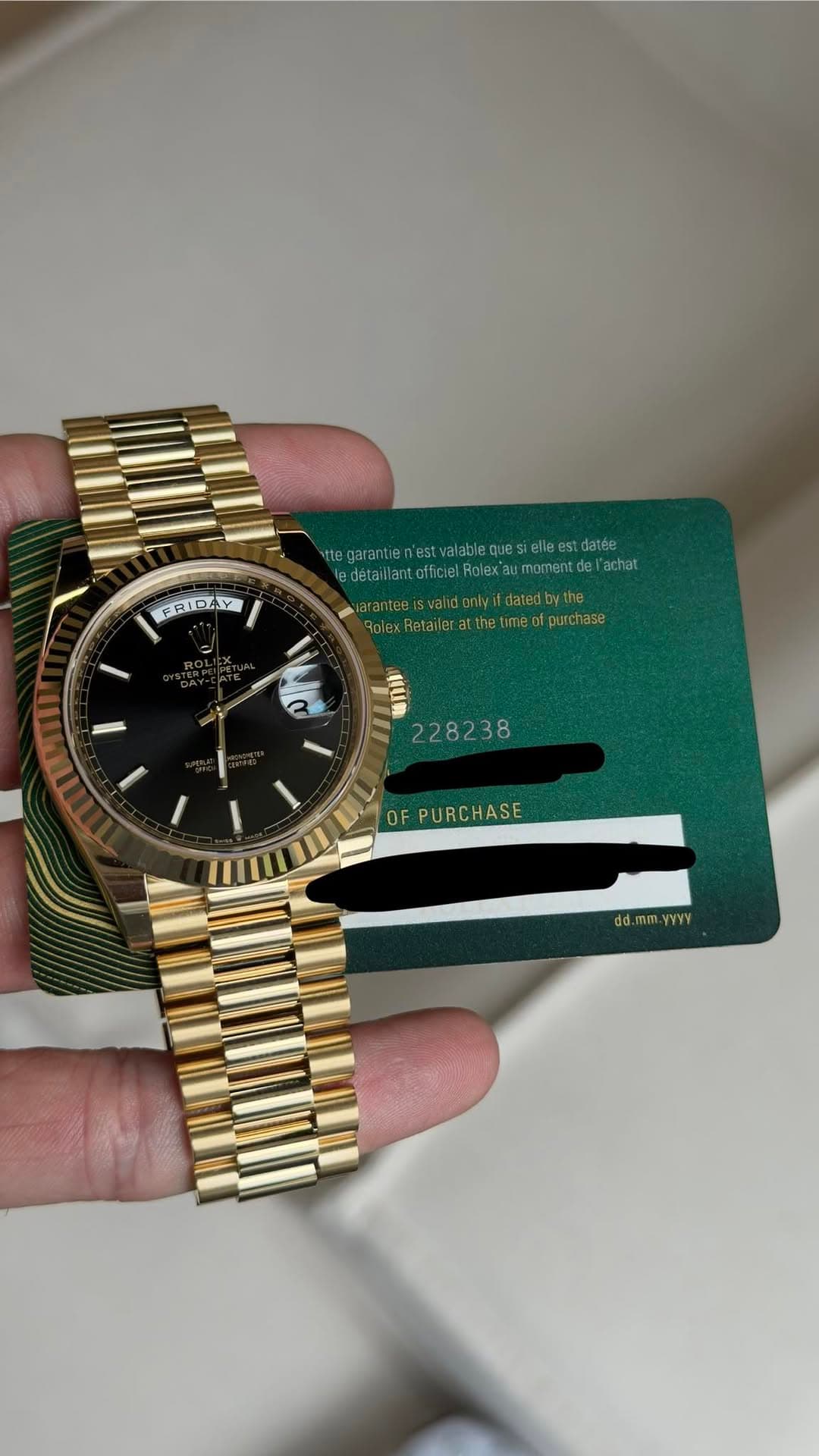 May be an image of wrist watch and text