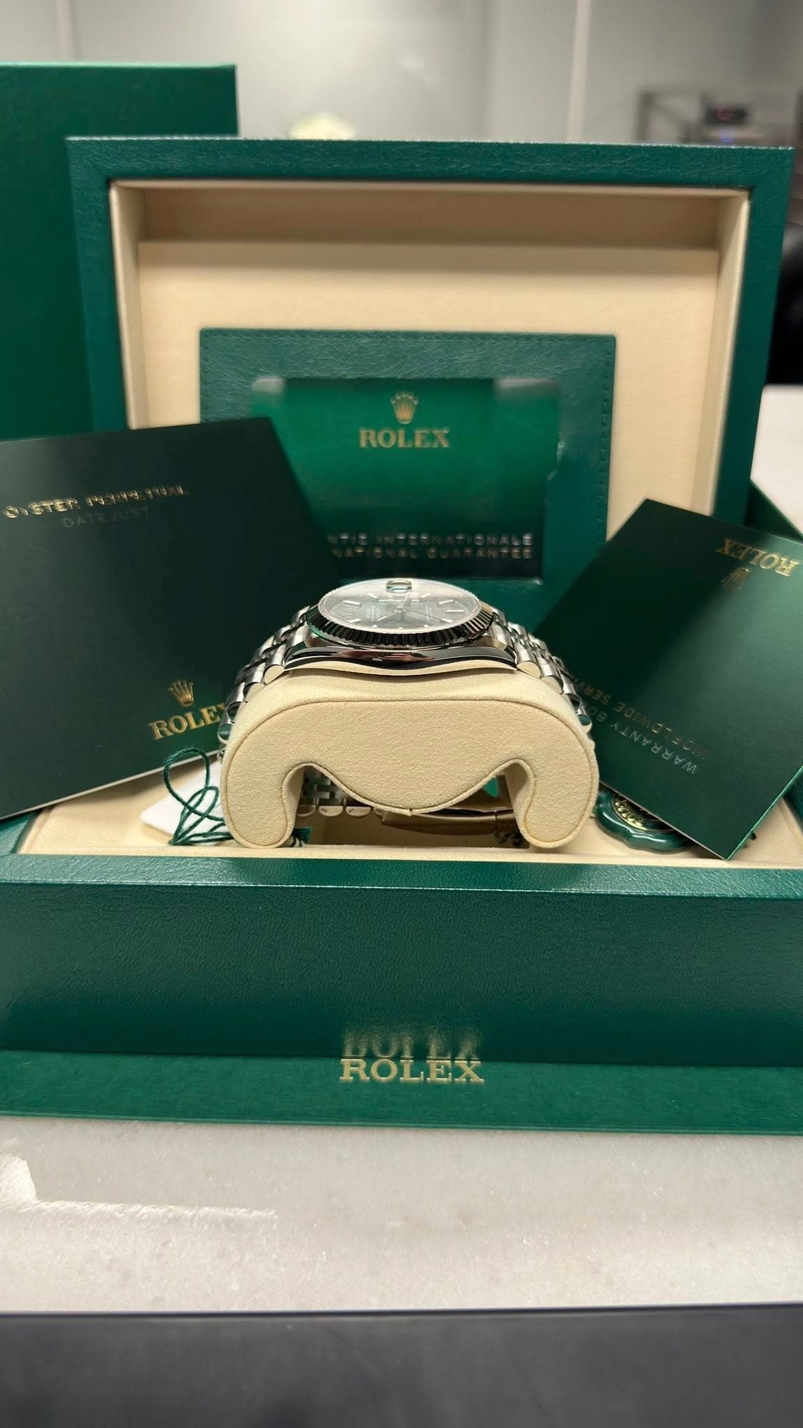 May be an image of wrist watch and text that says 'ROLEX צס ROLE ROLEX'