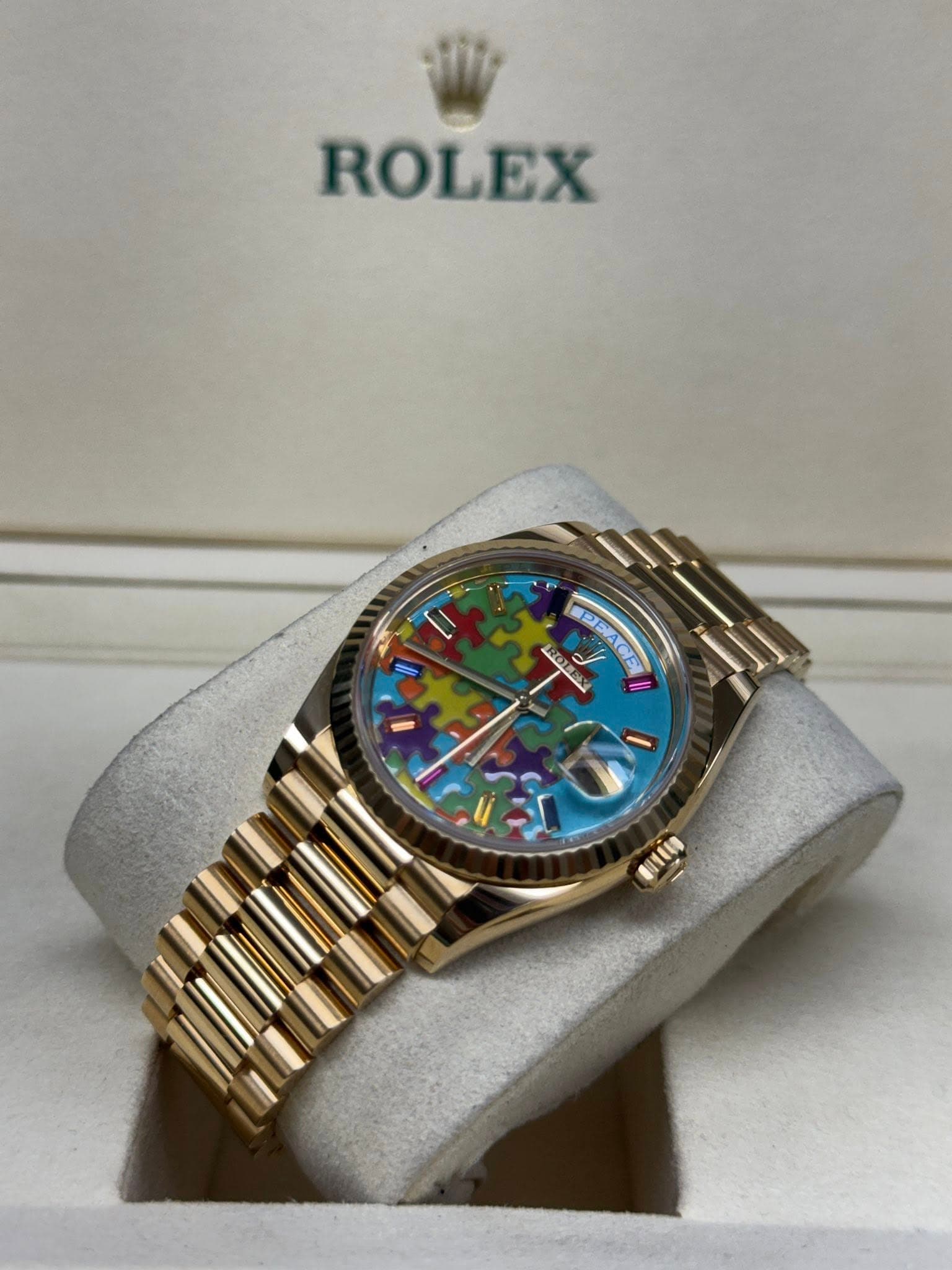 May be an image of wrist watch and text