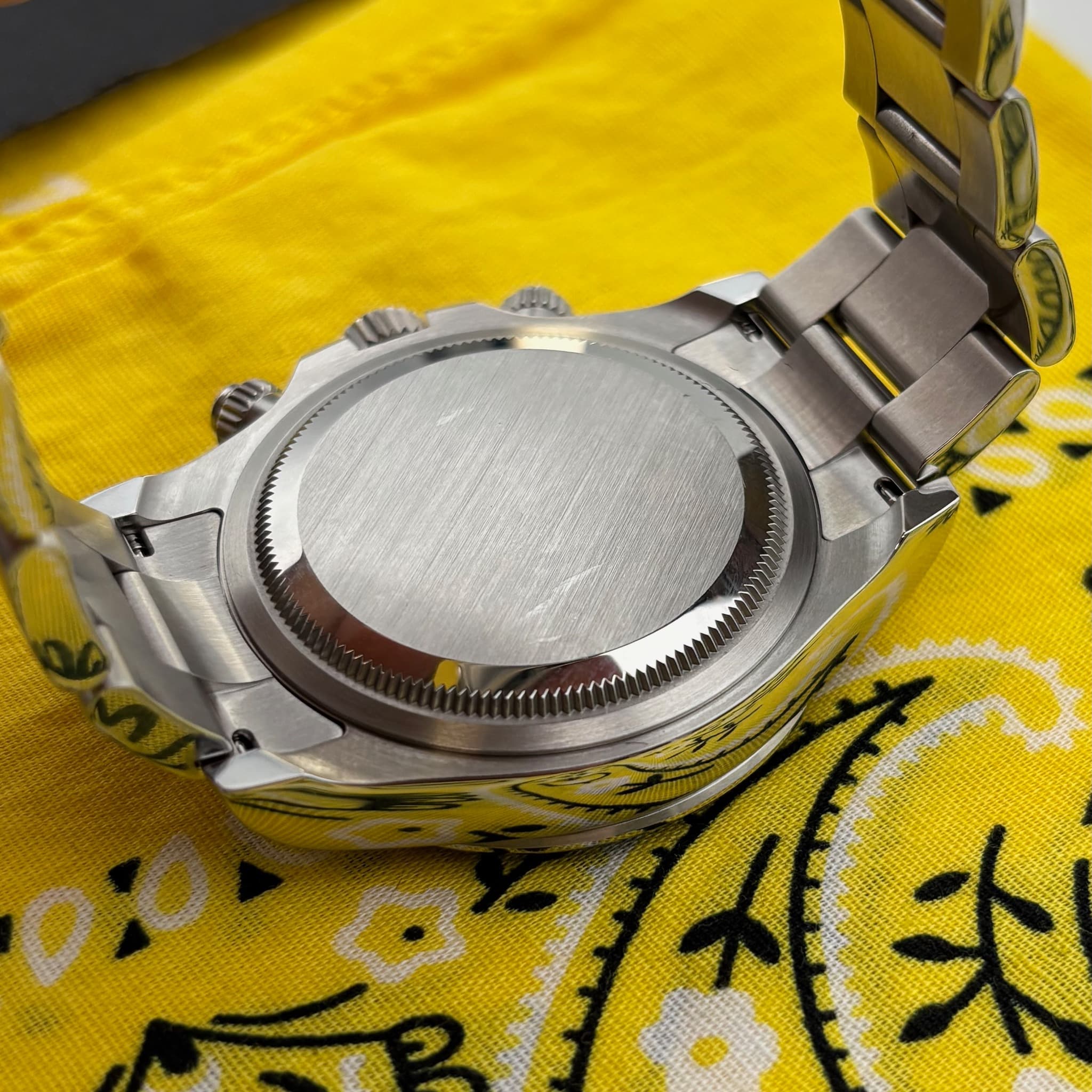 May be an image of wrist watch and text