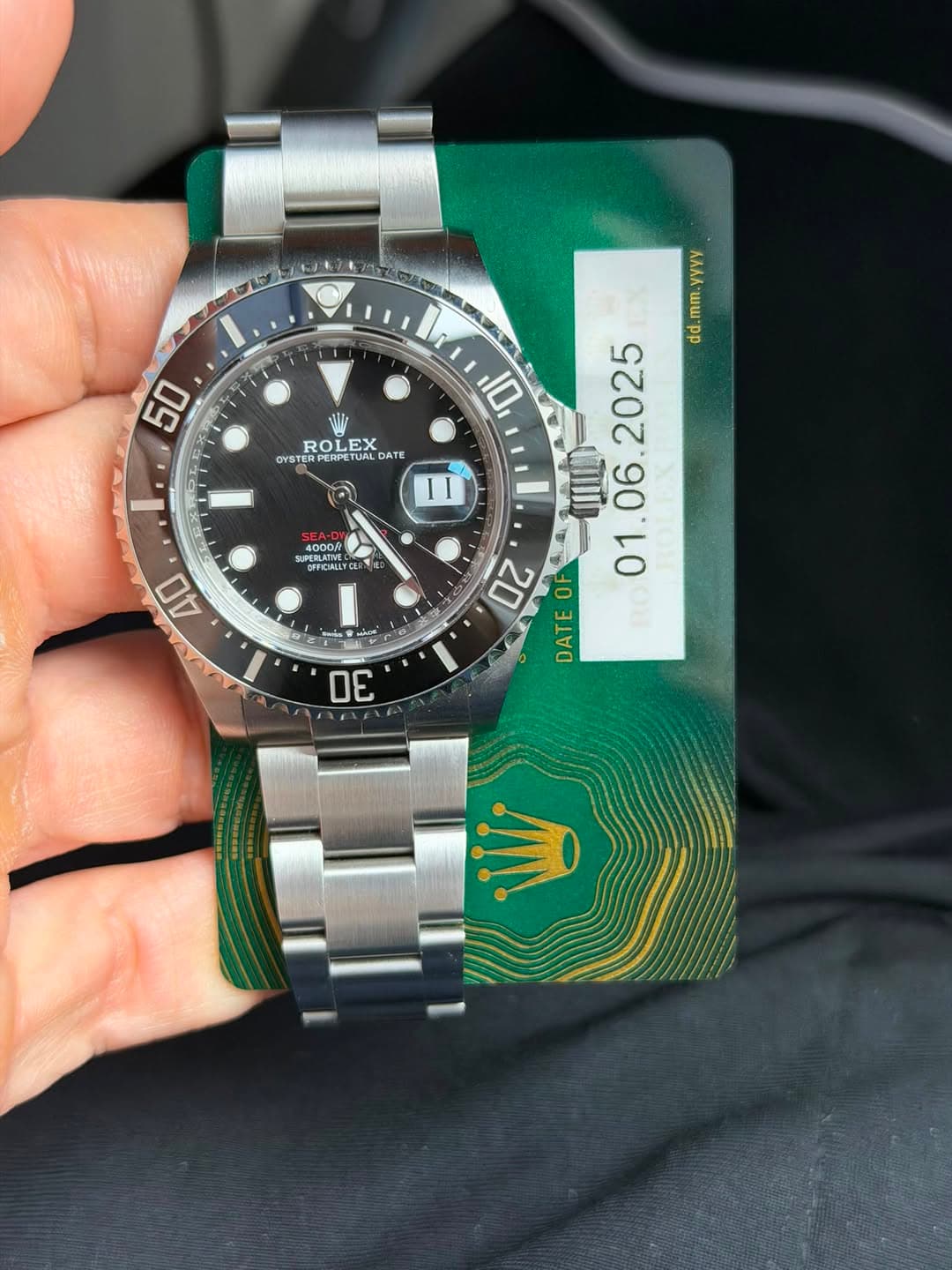 May be an image of wrist watch and text