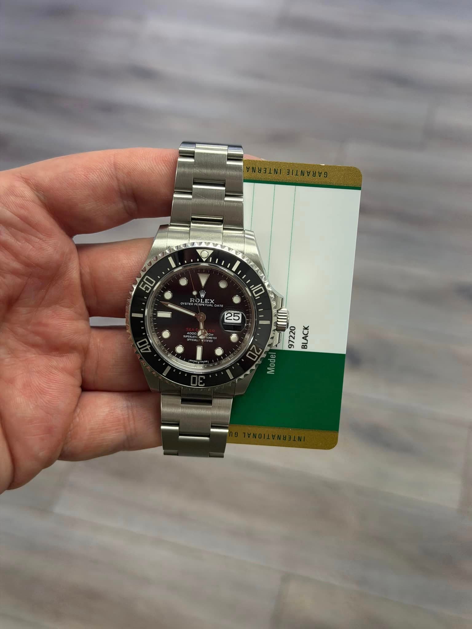 May be an image of wrist watch and text that says 'D L. 50 LE AC BLACK'