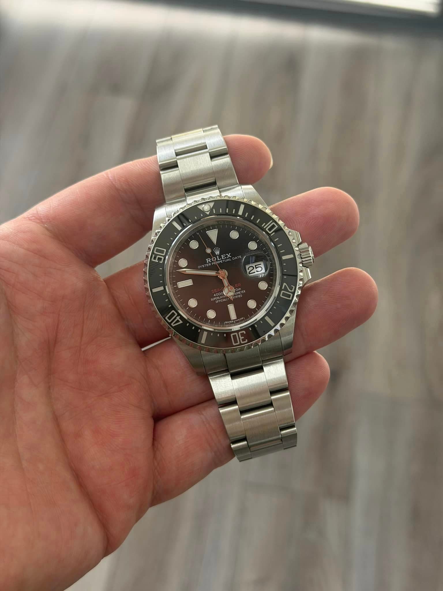 May be an image of wrist watch and text