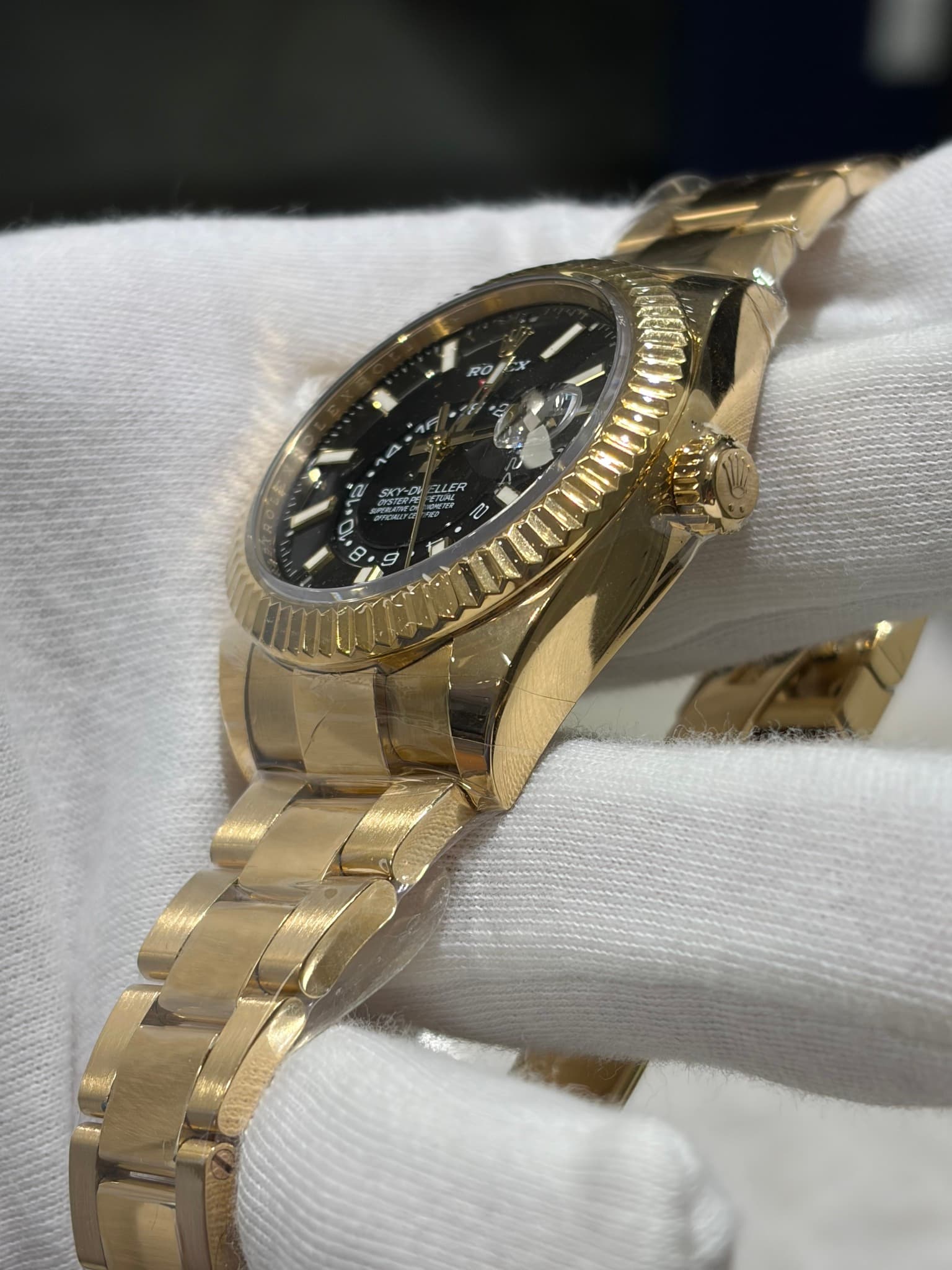 May be an image of wrist watch and text