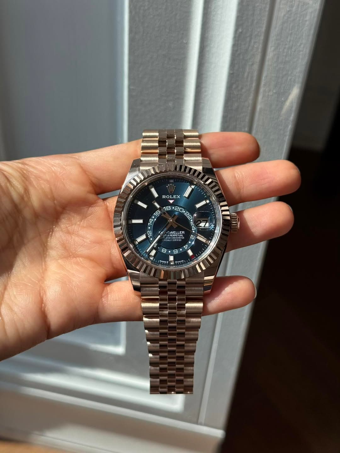 May be an image of wrist watch and text