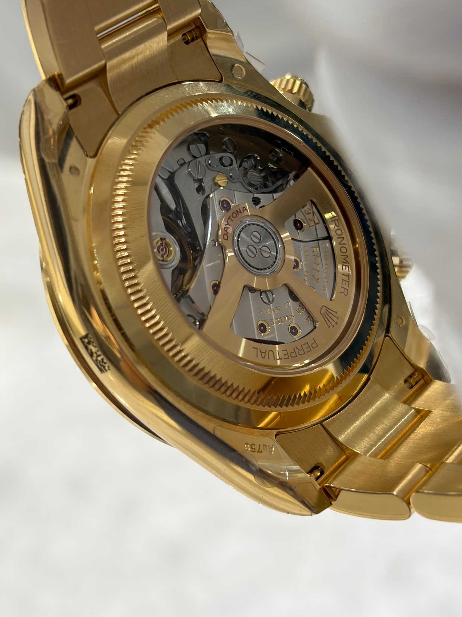 May be an image of wrist watch and text