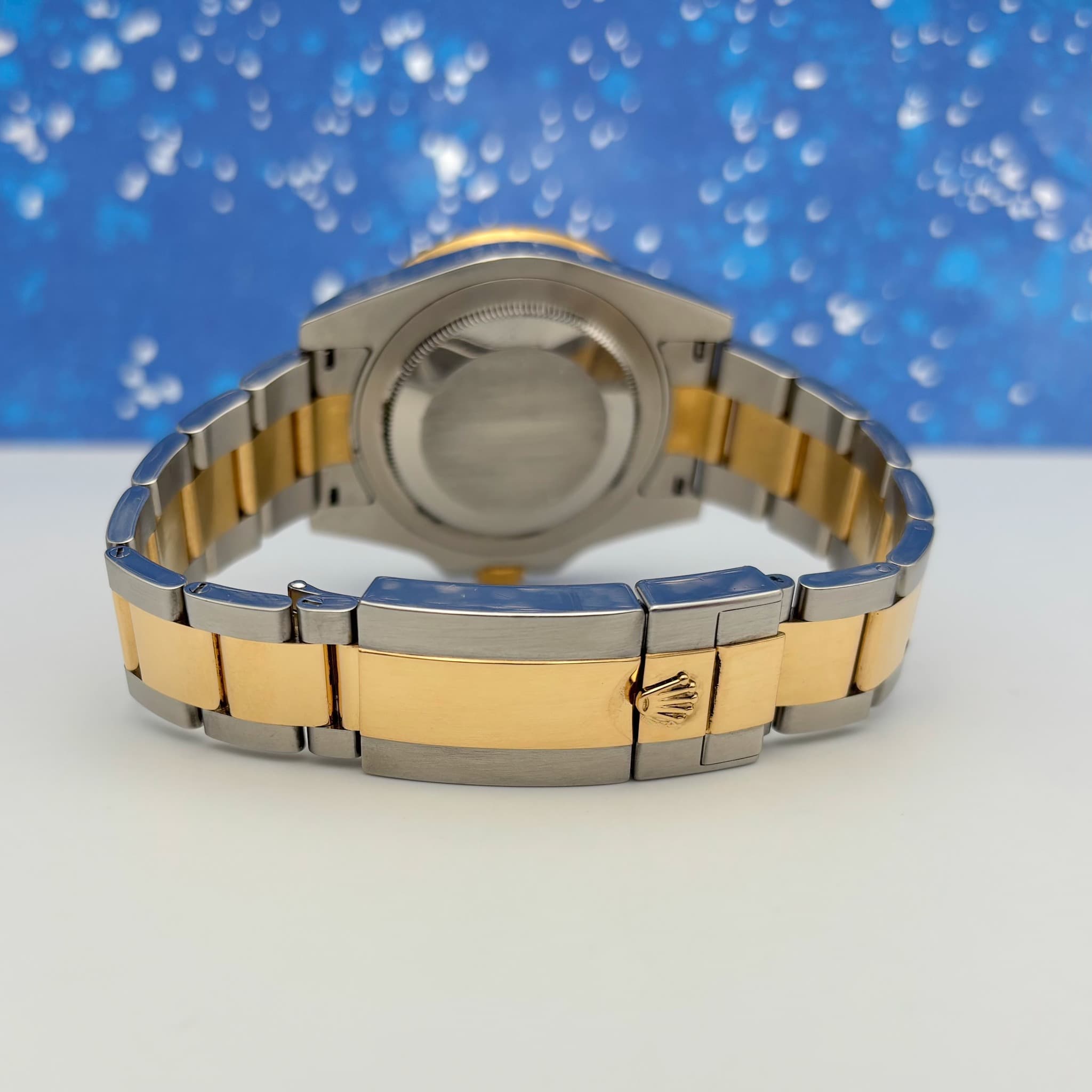 May be an image of wrist watch and text