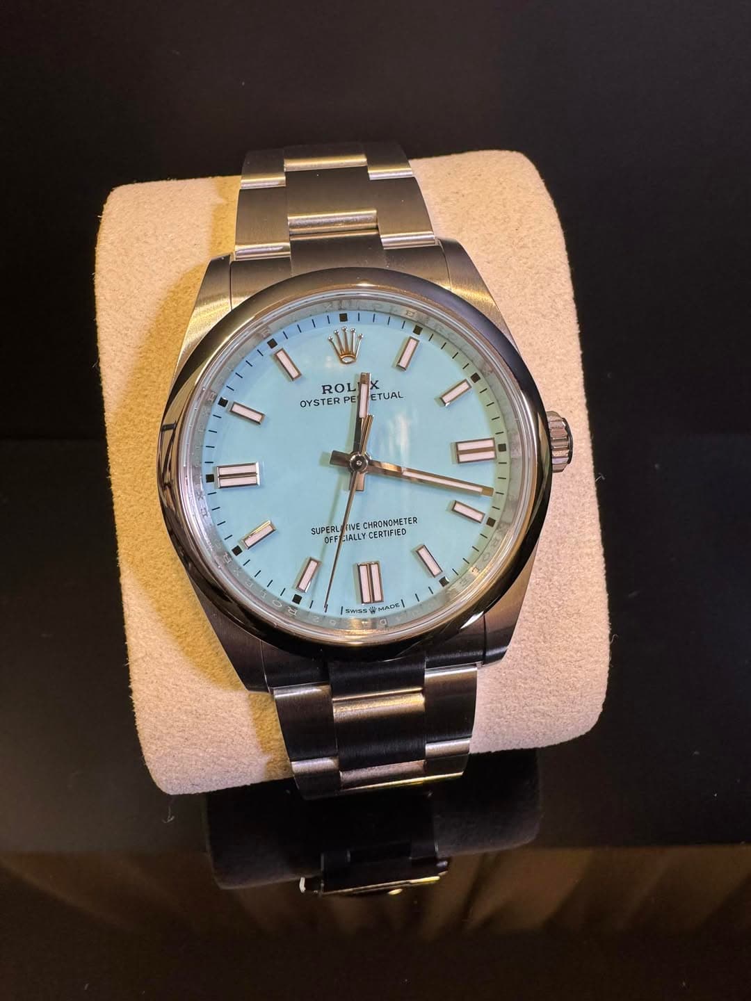 May be an image of wrist watch and text
