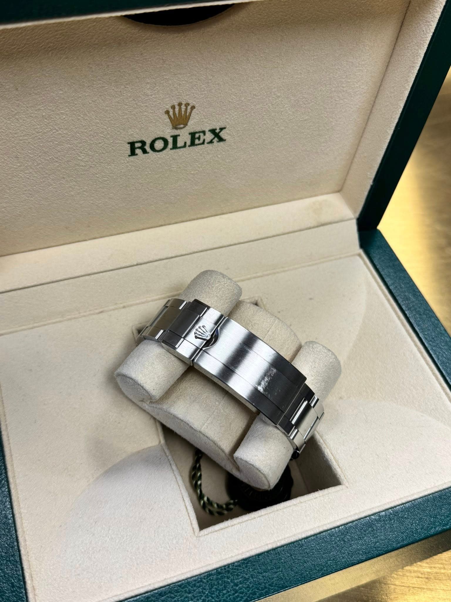 May be an image of ring, wrist watch and text that says '1 M ROLEX In'