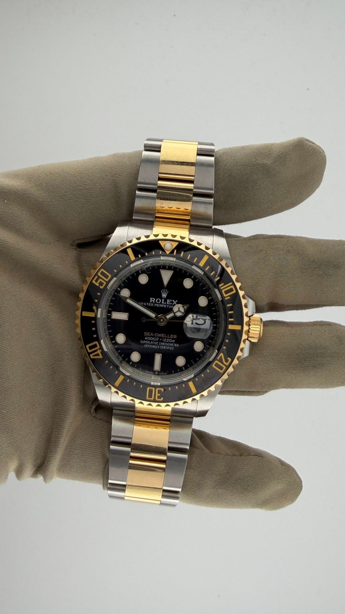 May be an image of wrist watch and text