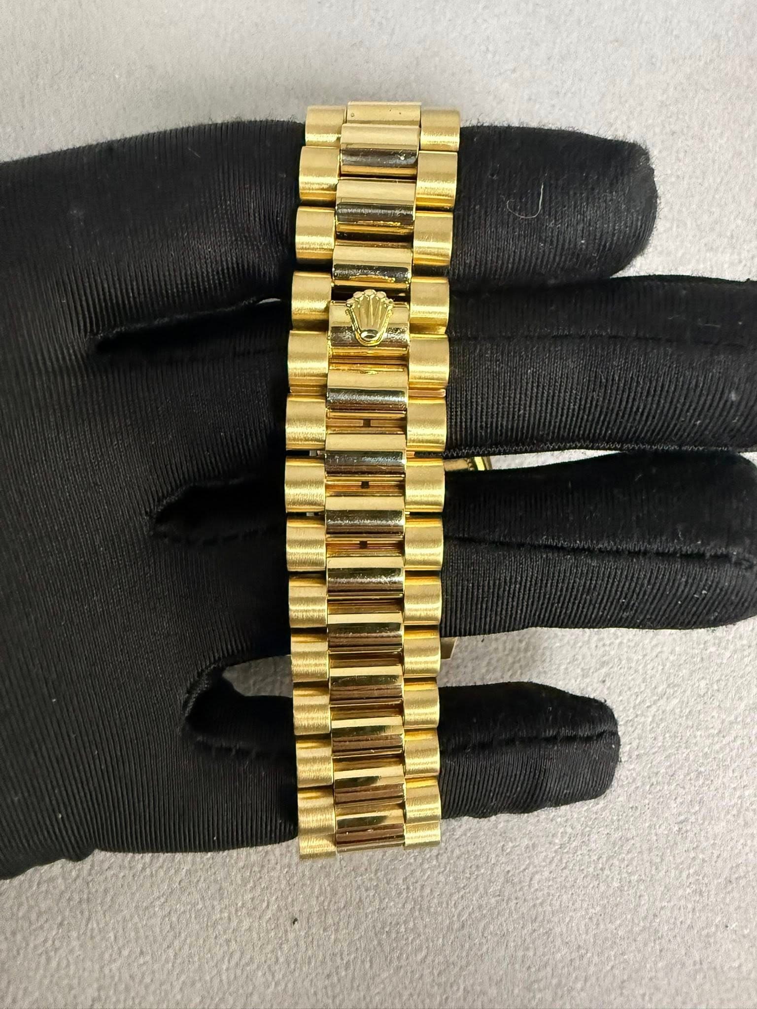 May be an image of wrist watch