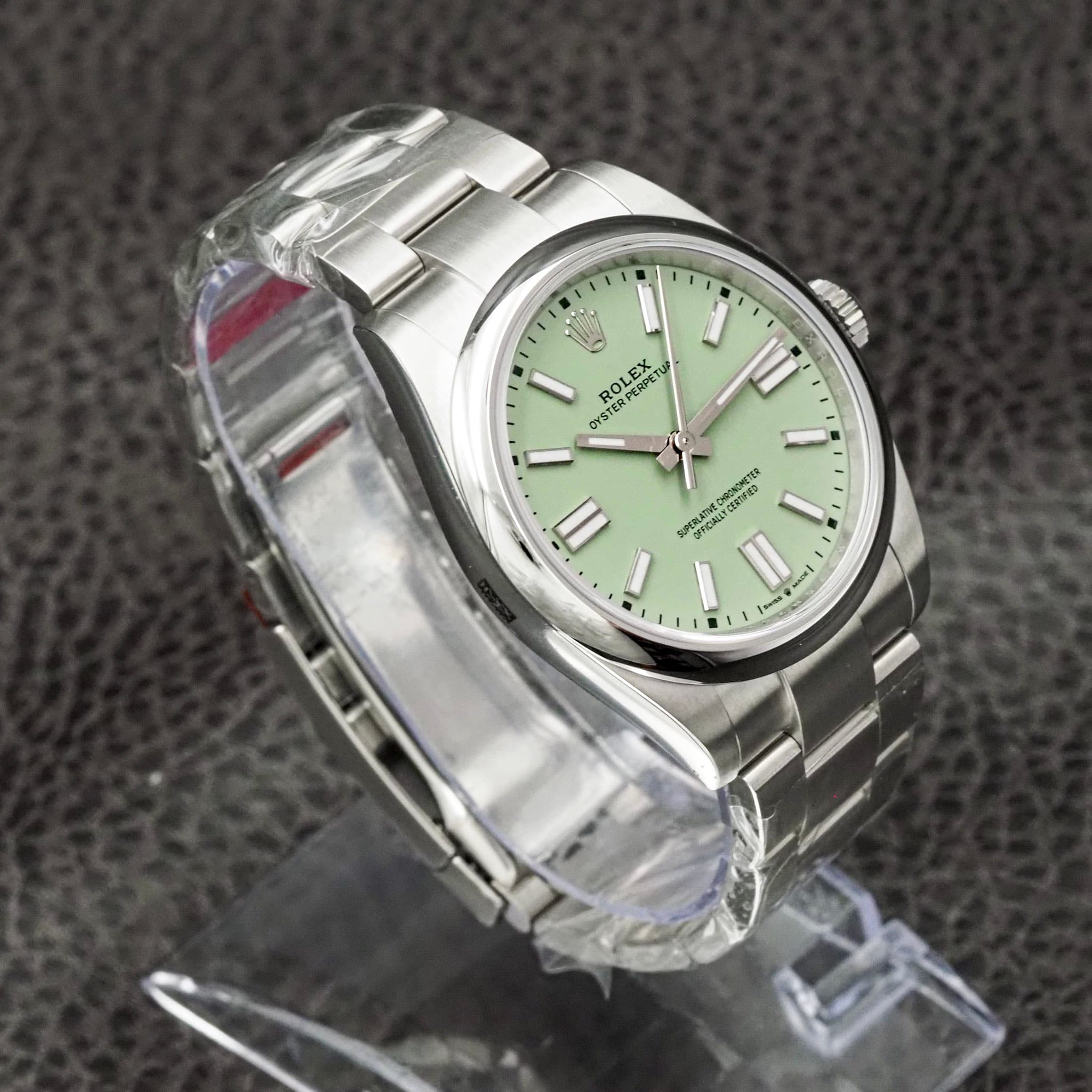 May be an image of wrist watch and text