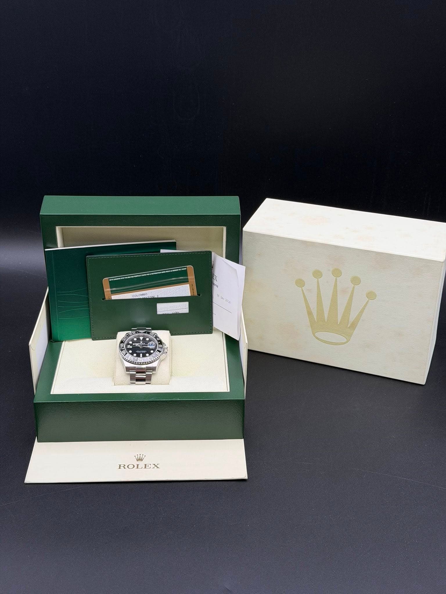 May be an image of wrist watch and text that says 'ด้ - Wi W ROLEX EX ROL'