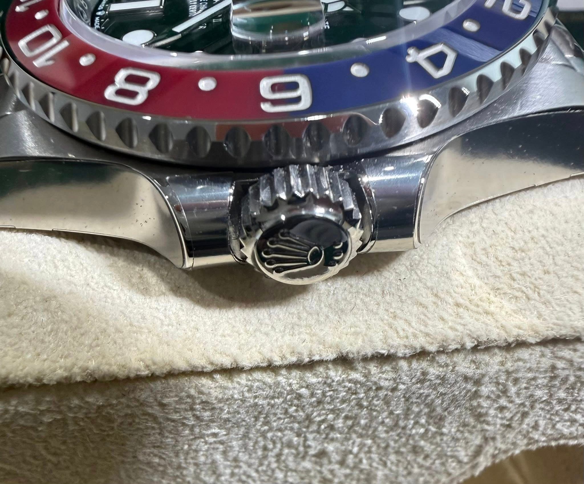 May be an image of wrist watch and text