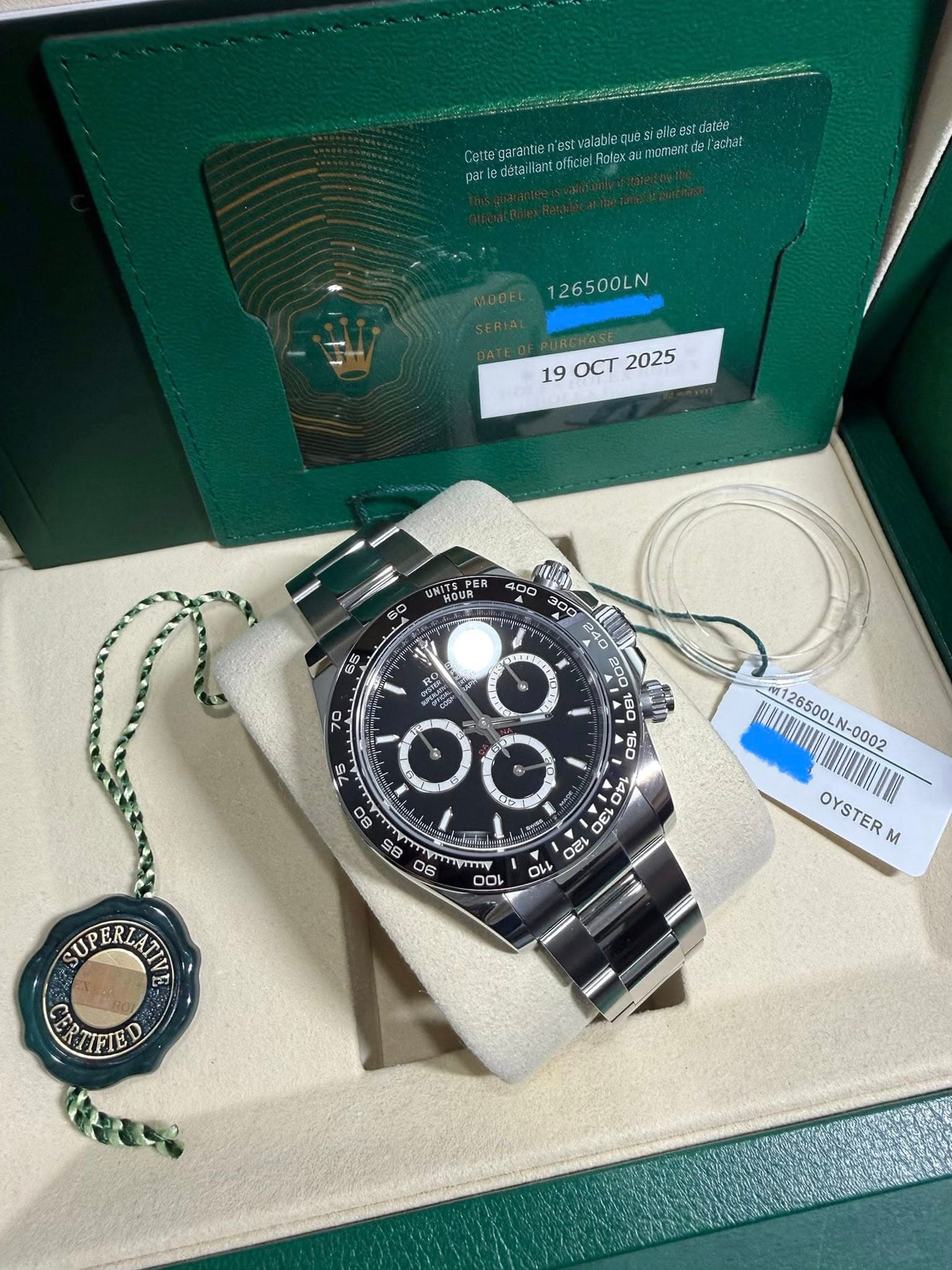 May be an image of wrist watch and text that says 'Cettegarantie parledeta que Stefia Rolex aw momenat achat 126500LN 190CT2025 19 OCT 2025 UNITSPER HOUR Bdo 200 P00 PL οει こ…