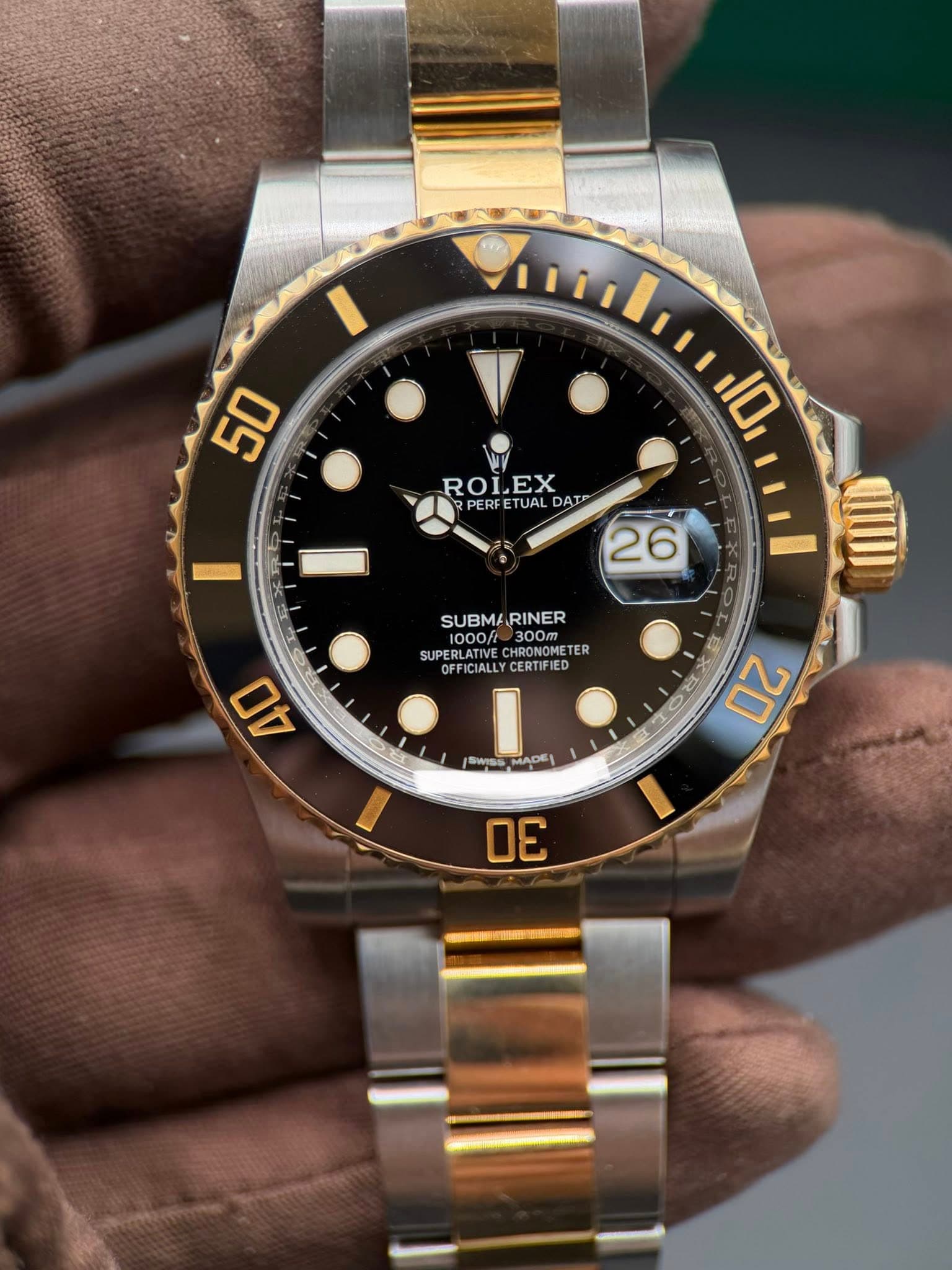 May be an image of wrist watch and text that says '50 ROLEX PERFETUAL ETUAL DAIP PERF 10 26 SUBMARINER RINER SUBMAR 1000/t 300m SUPERLATIVE FFICIALLYCERTIFIED CERTIFIED HRONOME…