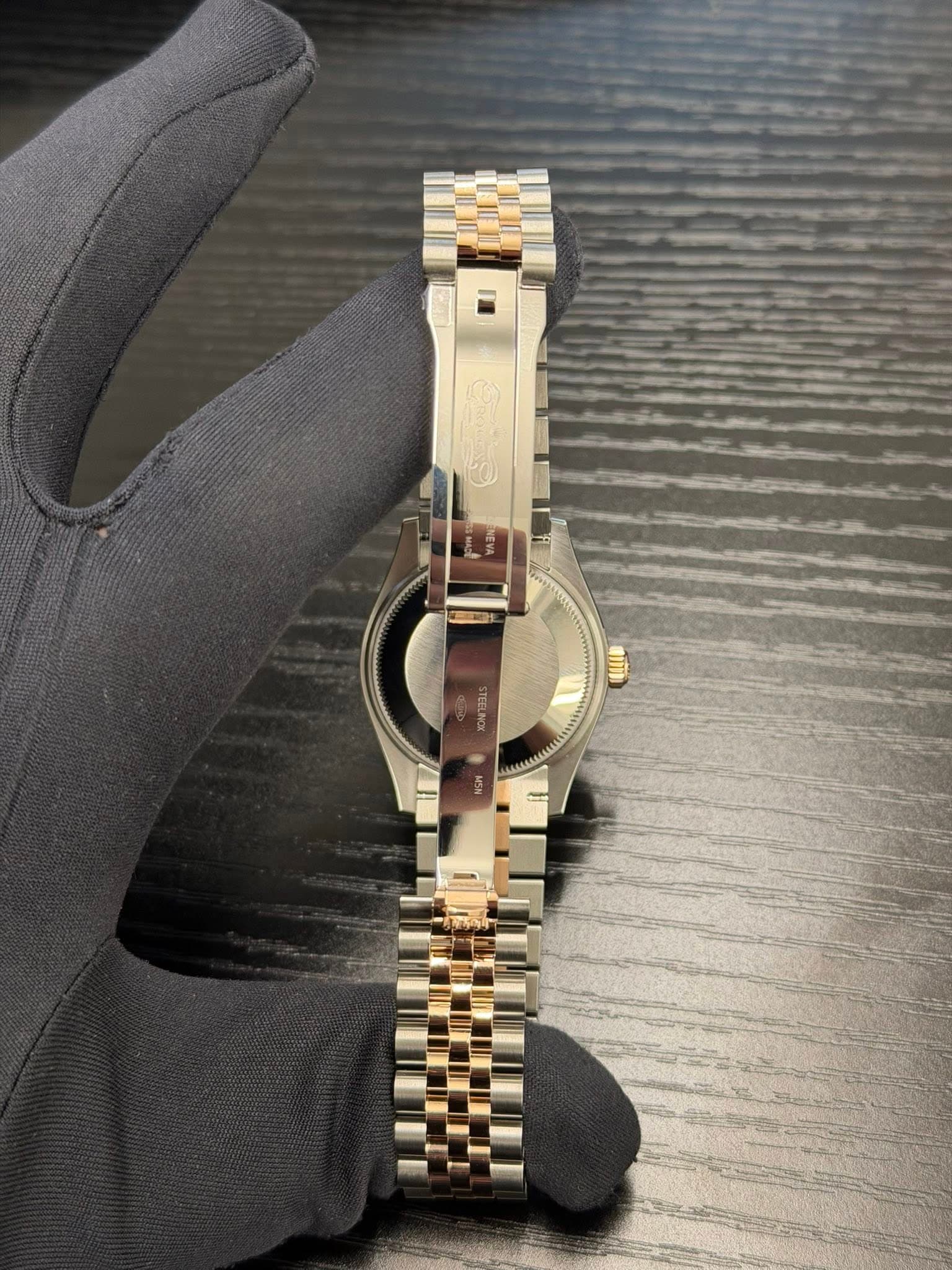 May be an image of digital watch and text