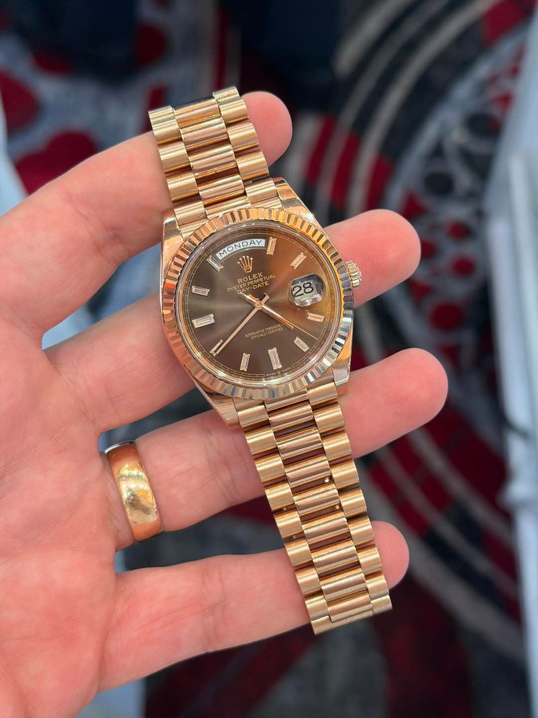 May be an image of wrist watch and text