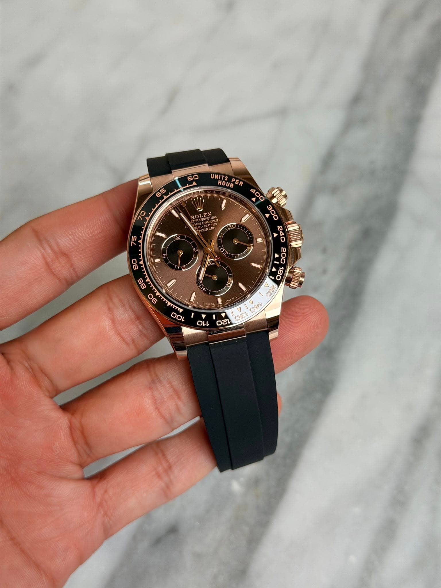May be an image of wrist watch and text