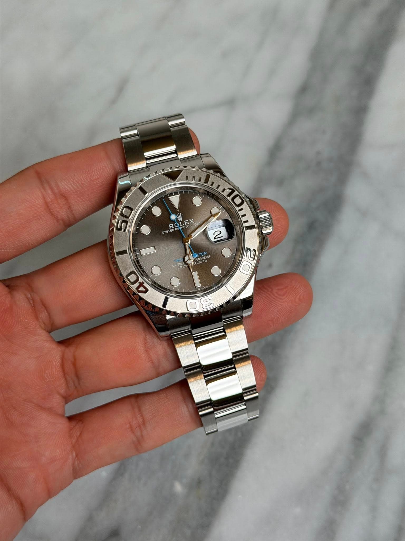 May be an image of wrist watch and text that says 'OL ROLEX EX ey EX M 3'
