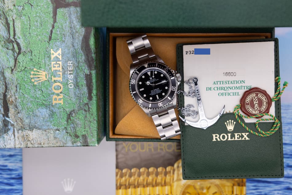 May be an image of wrist watch and text that says 'P32 P32 50 + 17 ROLEX OYSTER 20 40 DE O 16600 ATTESTATION DE ECHRONOMETRE OFFICIEL សអរេ TATONID MI YOUR YOURRO RO ROLEX'
