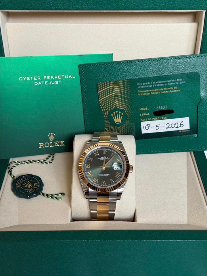 May be an image of wrist watch and text that says 'OYSTER OYSTERPERPETUAL PERPETUAL DATEJUST parletotaliant purthase Cogde wwwN 126333 MODEL SERIAL SERIAL DATE ATEOFPURCHASE RCHASEβ¦