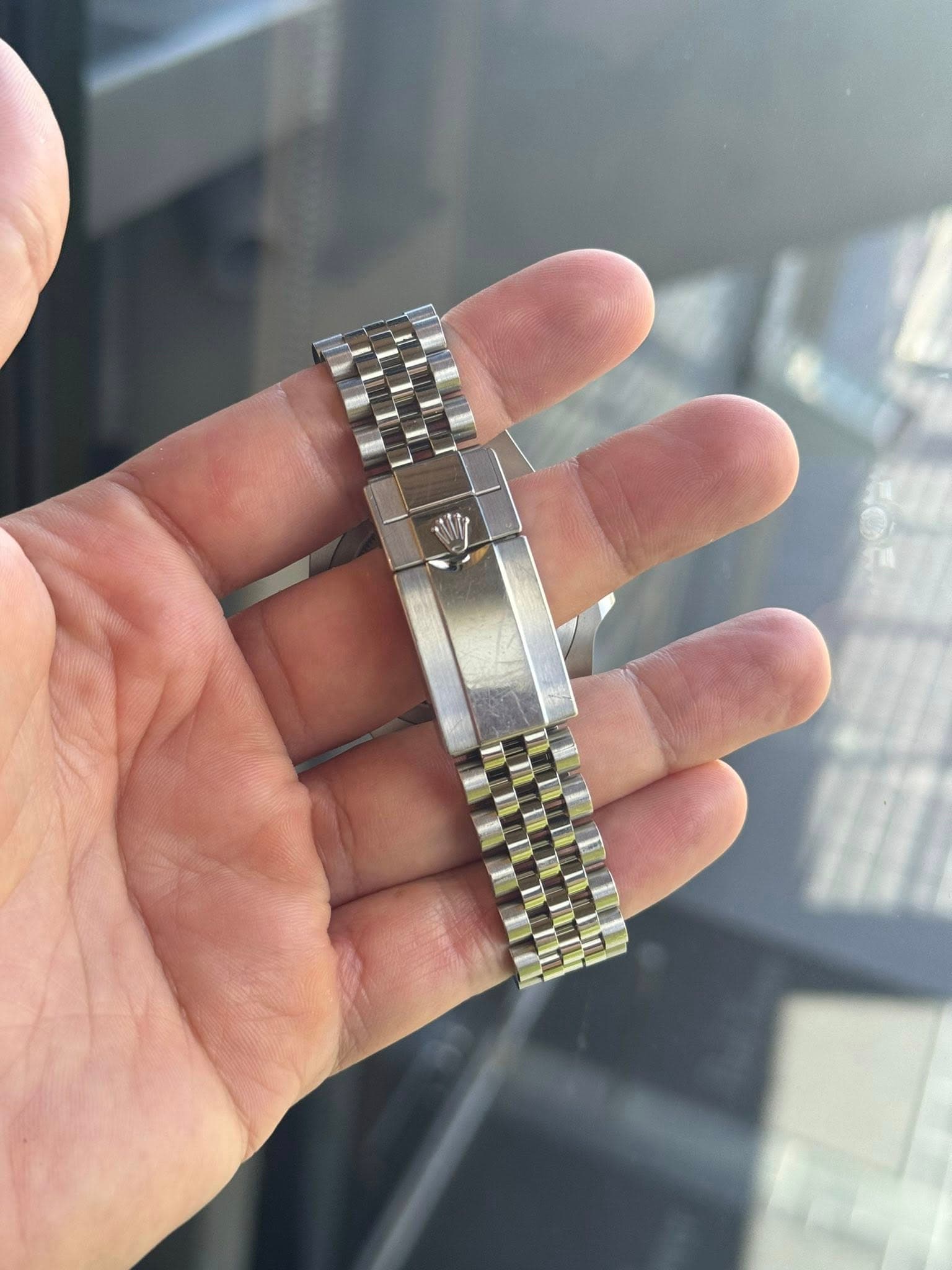 May be an image of wrist watch