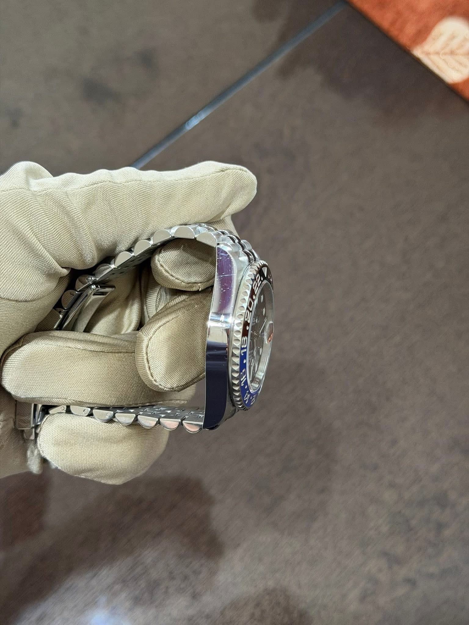 May be an image of wrist watch and ring