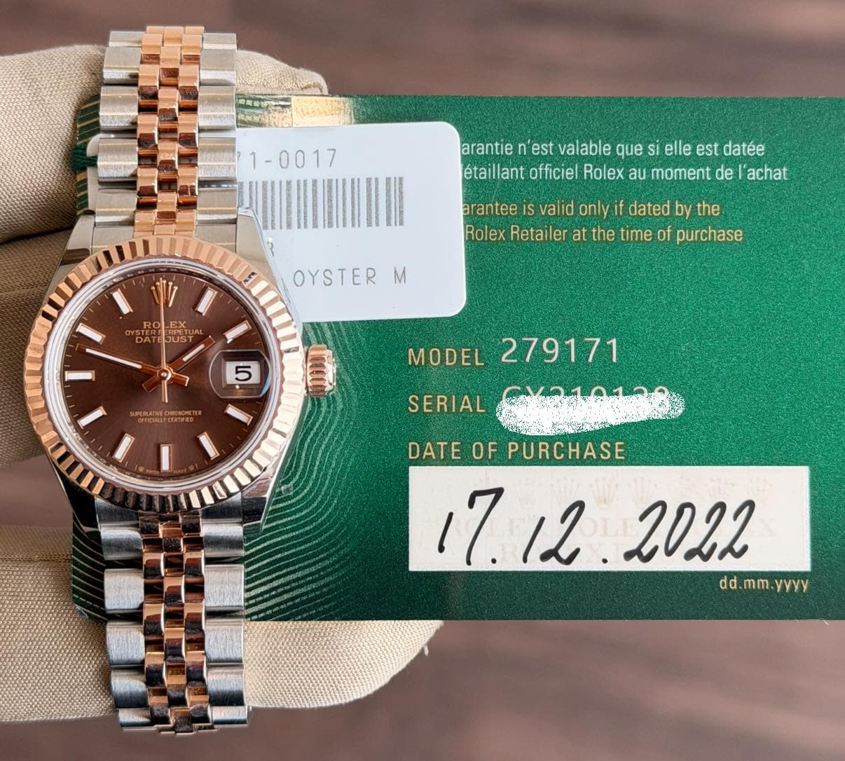 May be an image of wrist watch and text that says '1-0017 arantie n'est valable que si elle est datée étaillant officiel Rolex au moment de 'achat arantee is valid only dated by…