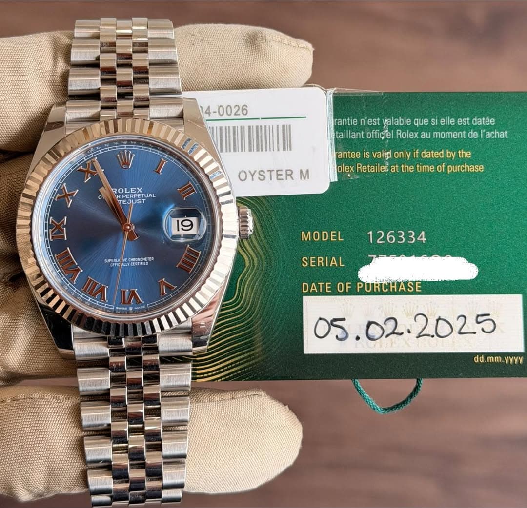 May be an image of wrist watch and text that says '14-0026 rantie 'est alable que ratien'estalalequese sie elle est datée tai lant offiçtel Rolex moment de achat ROLE ROLEX PERPETU…