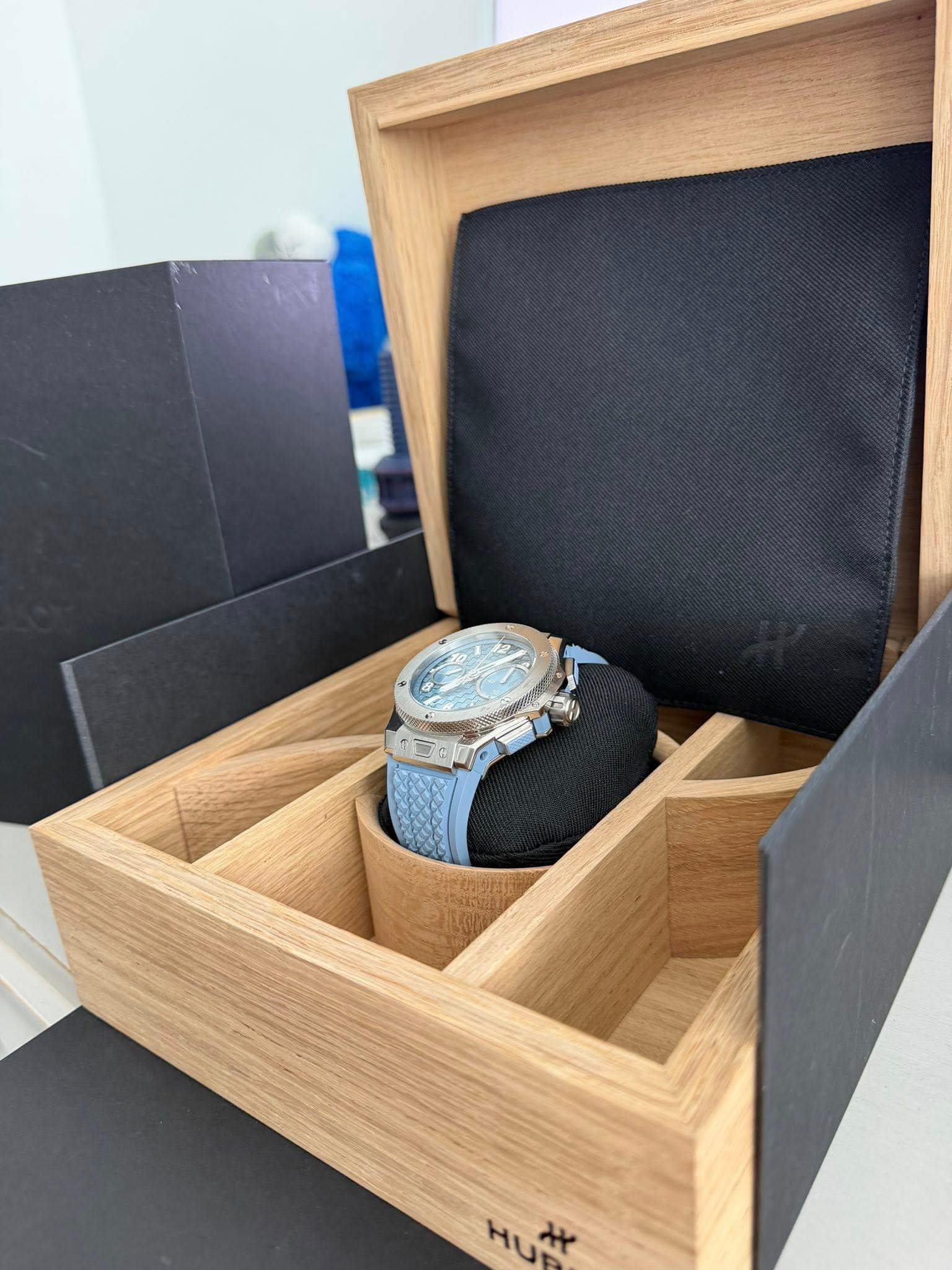 May be an image of wrist watch and text