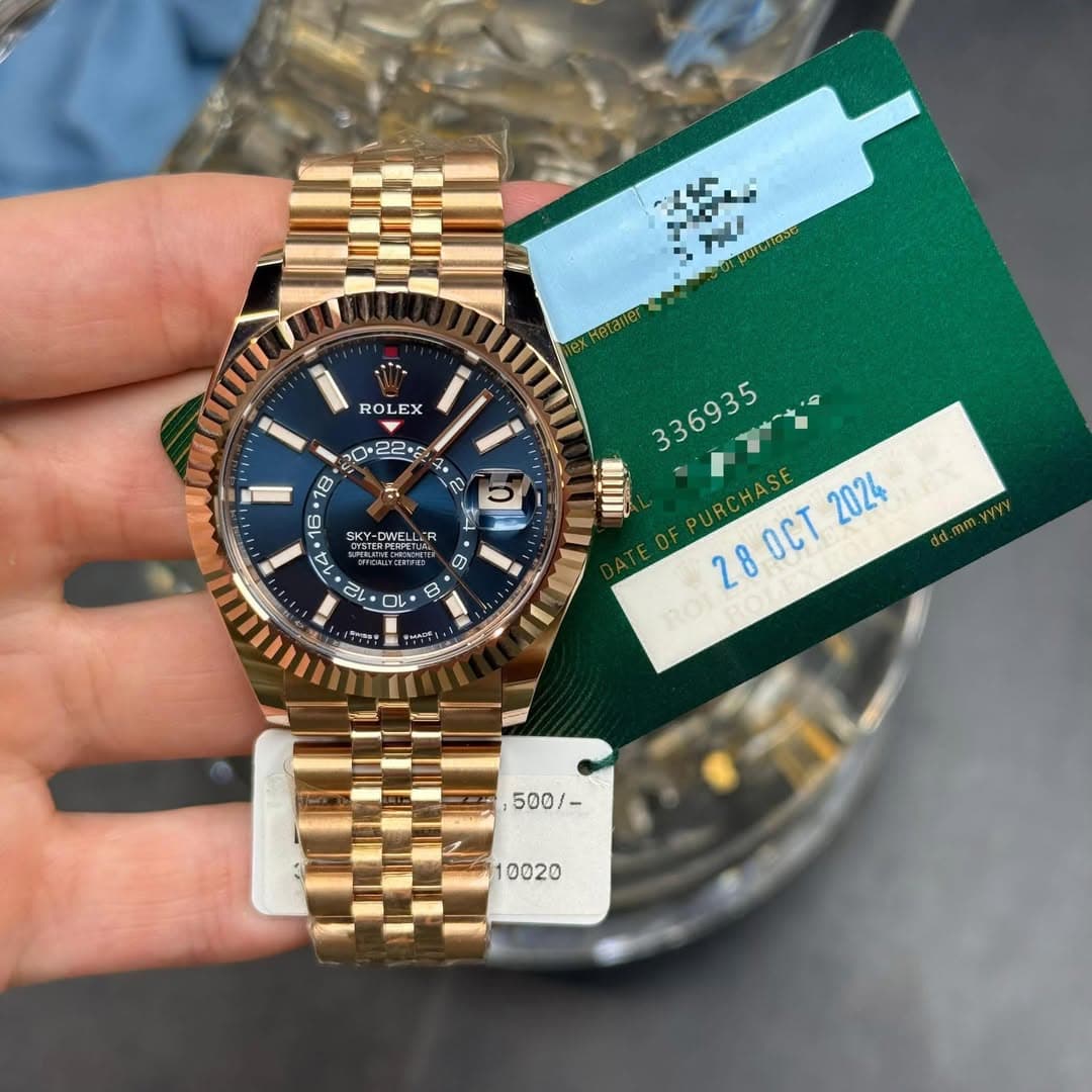 May be an image of wrist watch and text that says 'メ ROLEX 今 20+ 022.2 L 78 จี 16 14. ศร SKY-DWELLER ๙ร C ロ 0 336935 !!!! 2024 28 280CT OCT 500/ 10020'