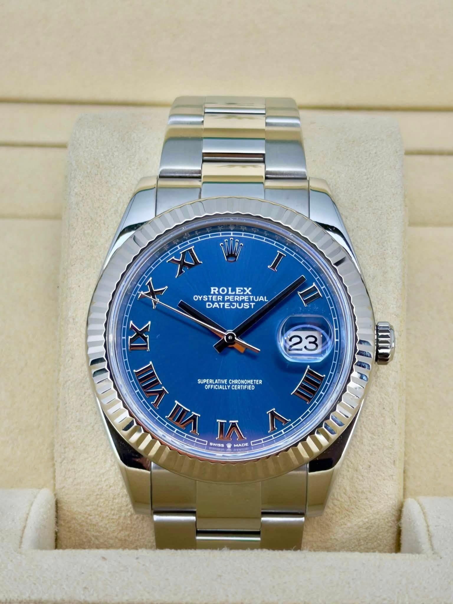 May be an image of wrist watch and text that says 'XI Wy ROLEX OYS OYSTER RPERPET RPETUAL TUAL DATEJUST I n 23 anii IX VIII SUPEBLATIVECHRONOMETER SUPER SUPERLATIVE CHRONOMETER…