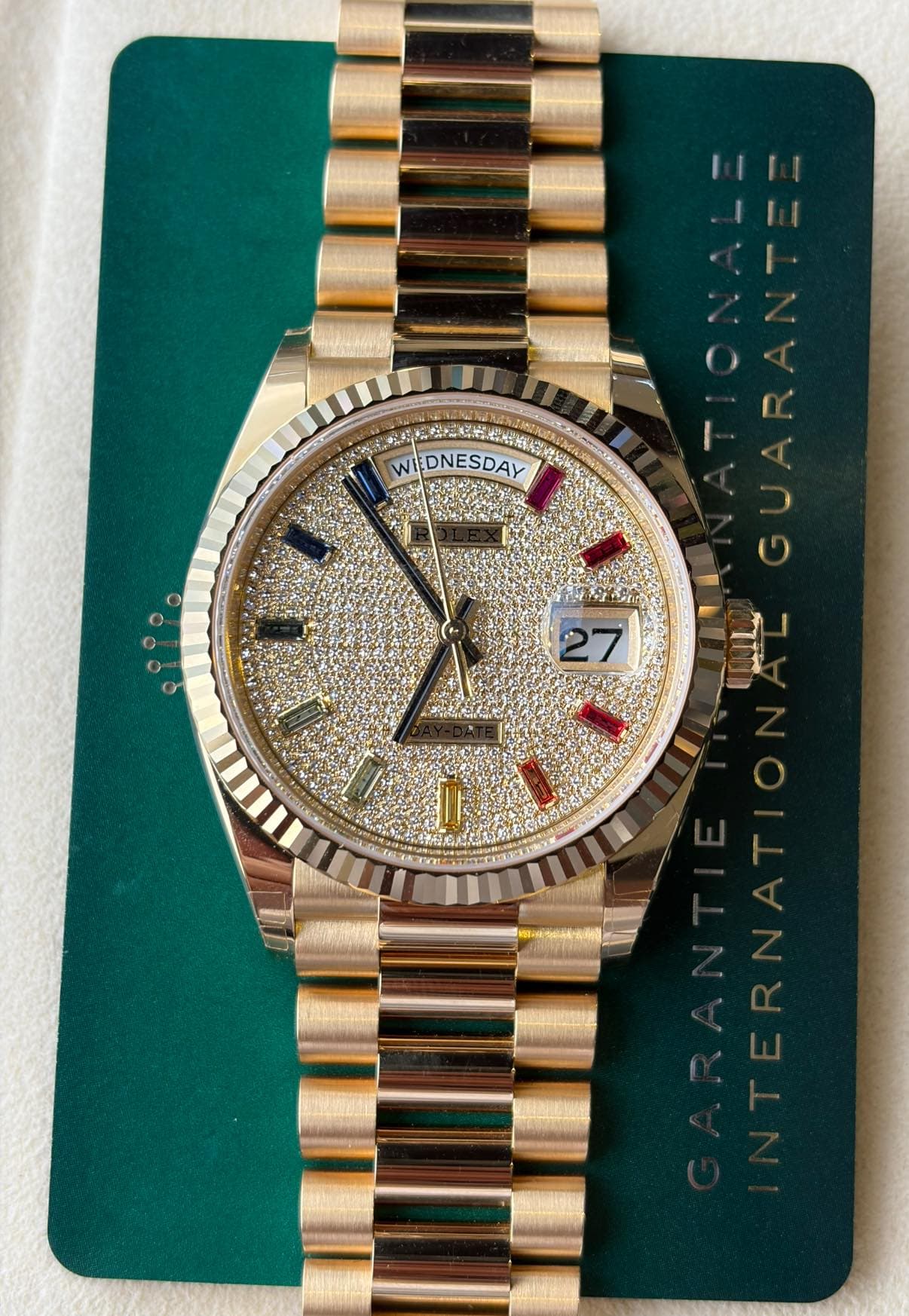 May be an image of wrist watch and text