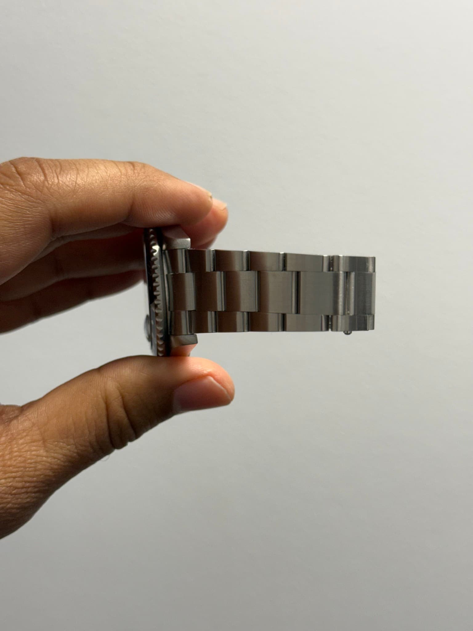 May be an image of wrist watch