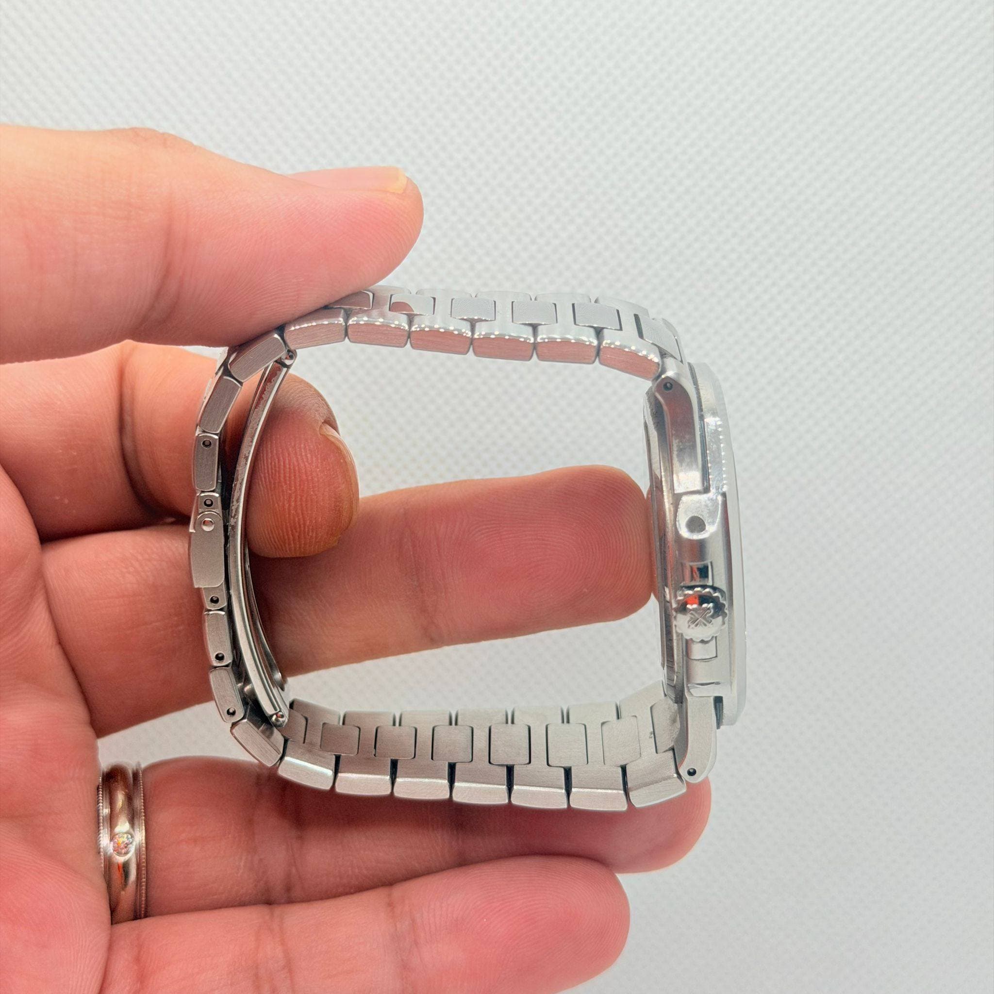 May be an image of digital watch