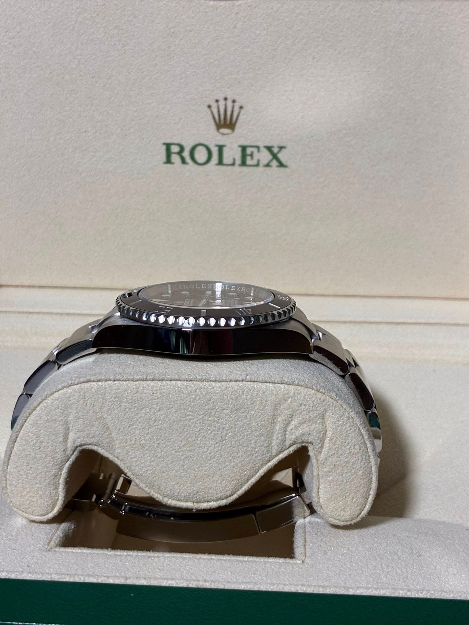 May be an image of wrist watch and text that says 'ROLEX'