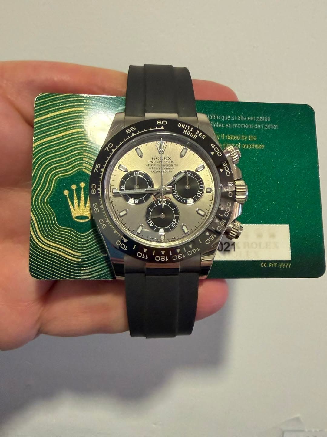 May be an image of wrist watch and text