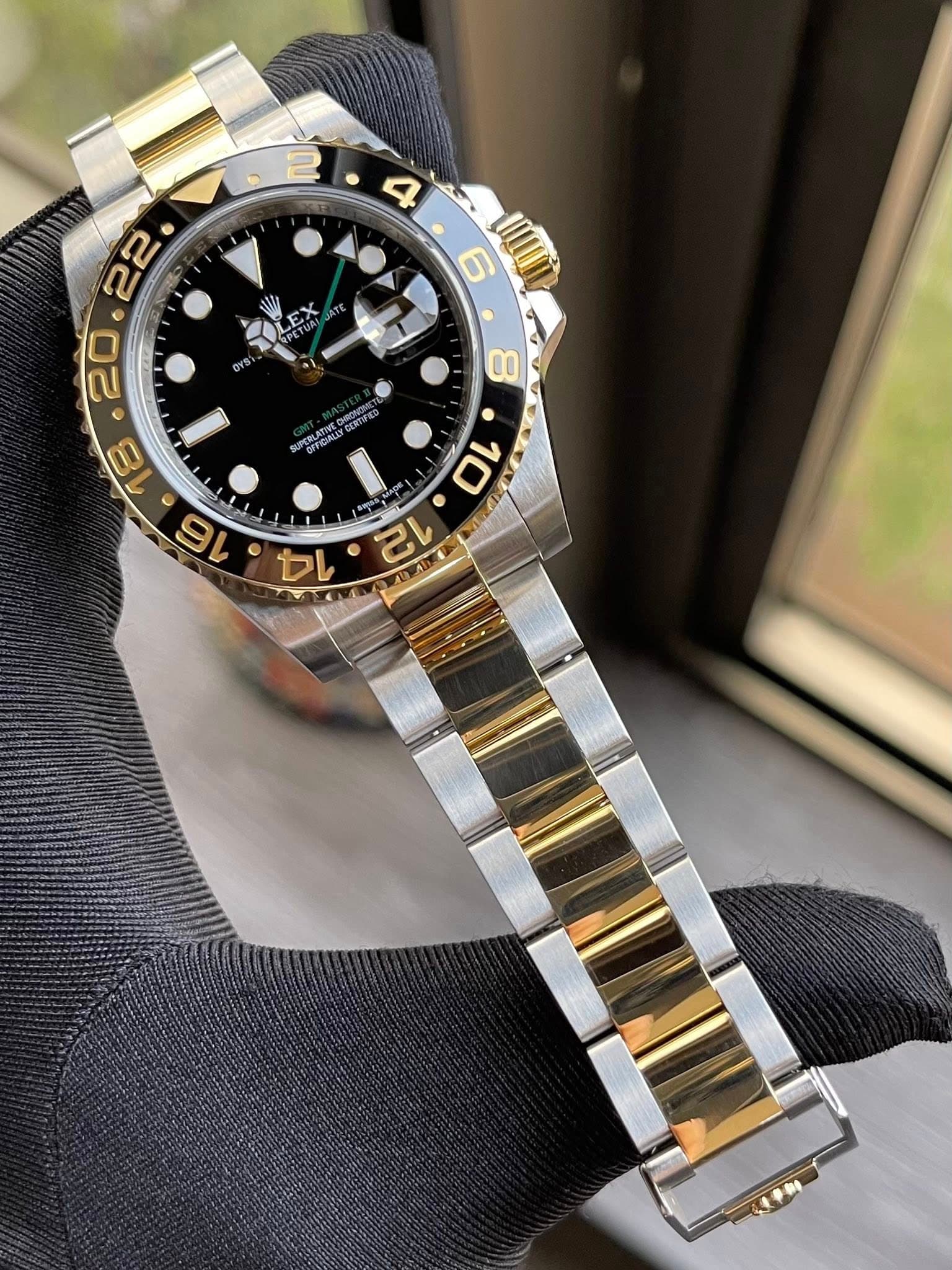 May be an image of wrist watch and text