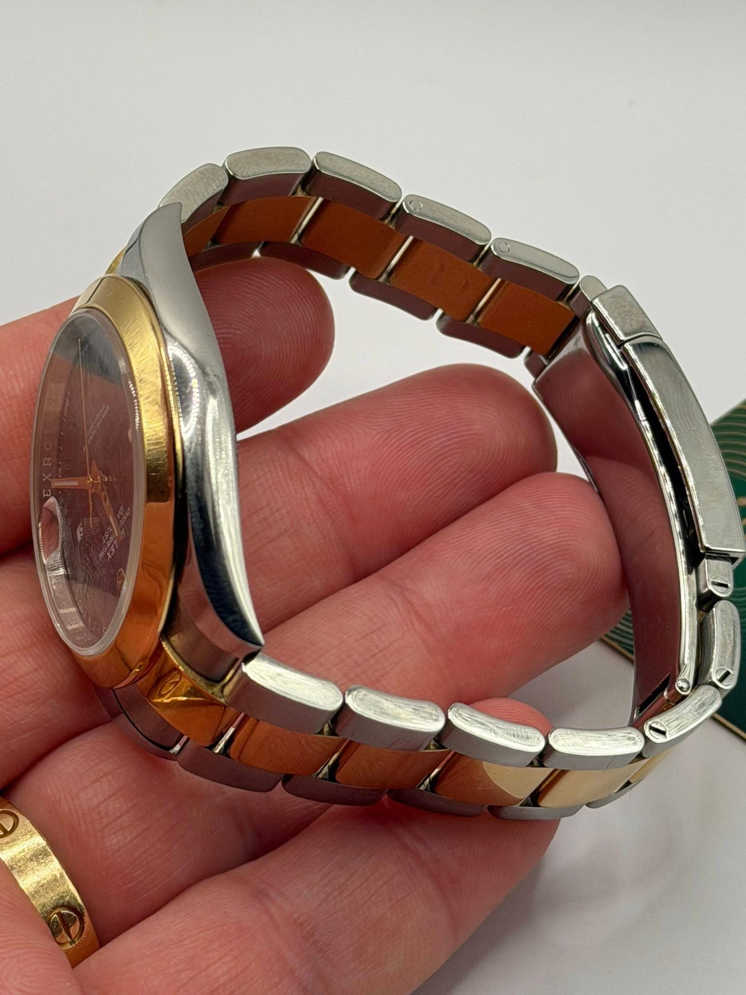 May be an image of wrist watch