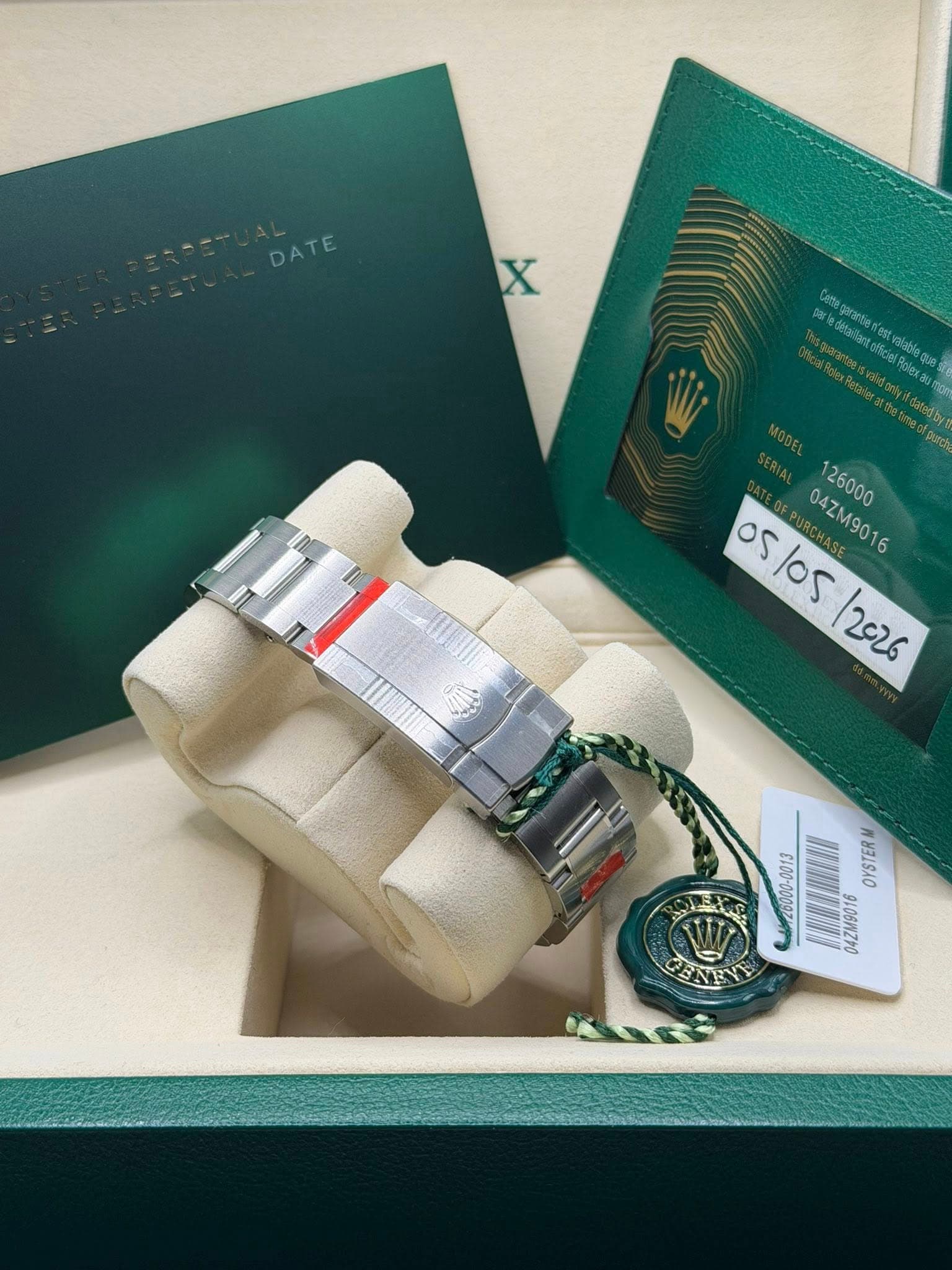 May be an image of wrist watch and text