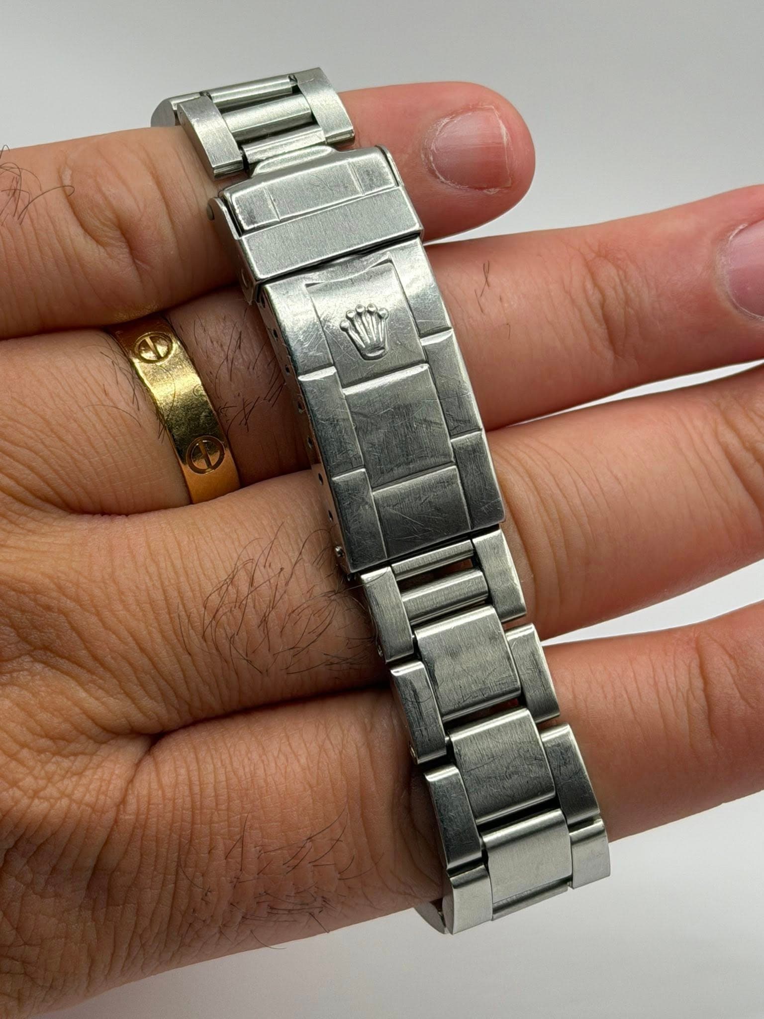 May be an image of ring and digital watch