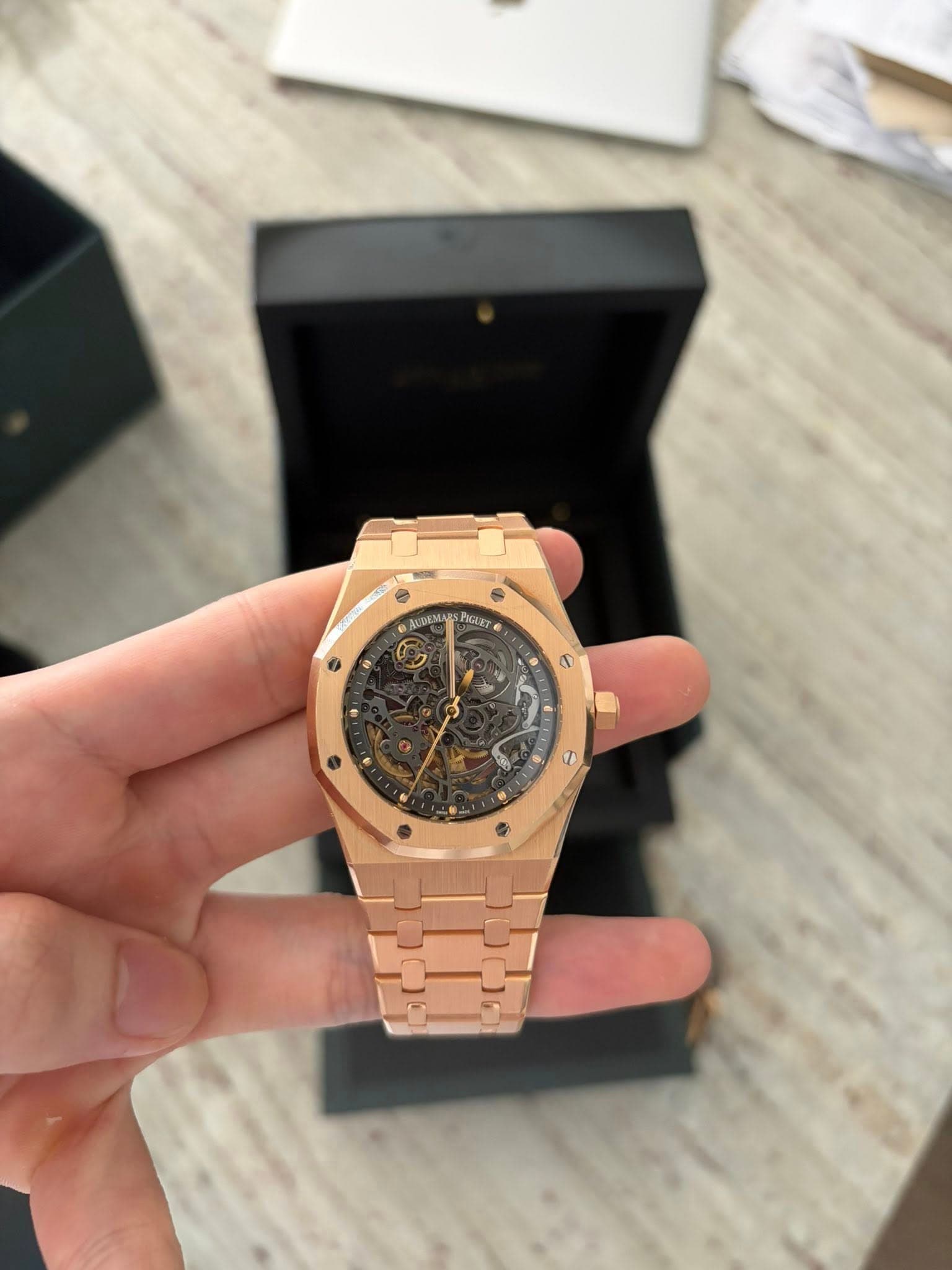 May be an image of wrist watch and text