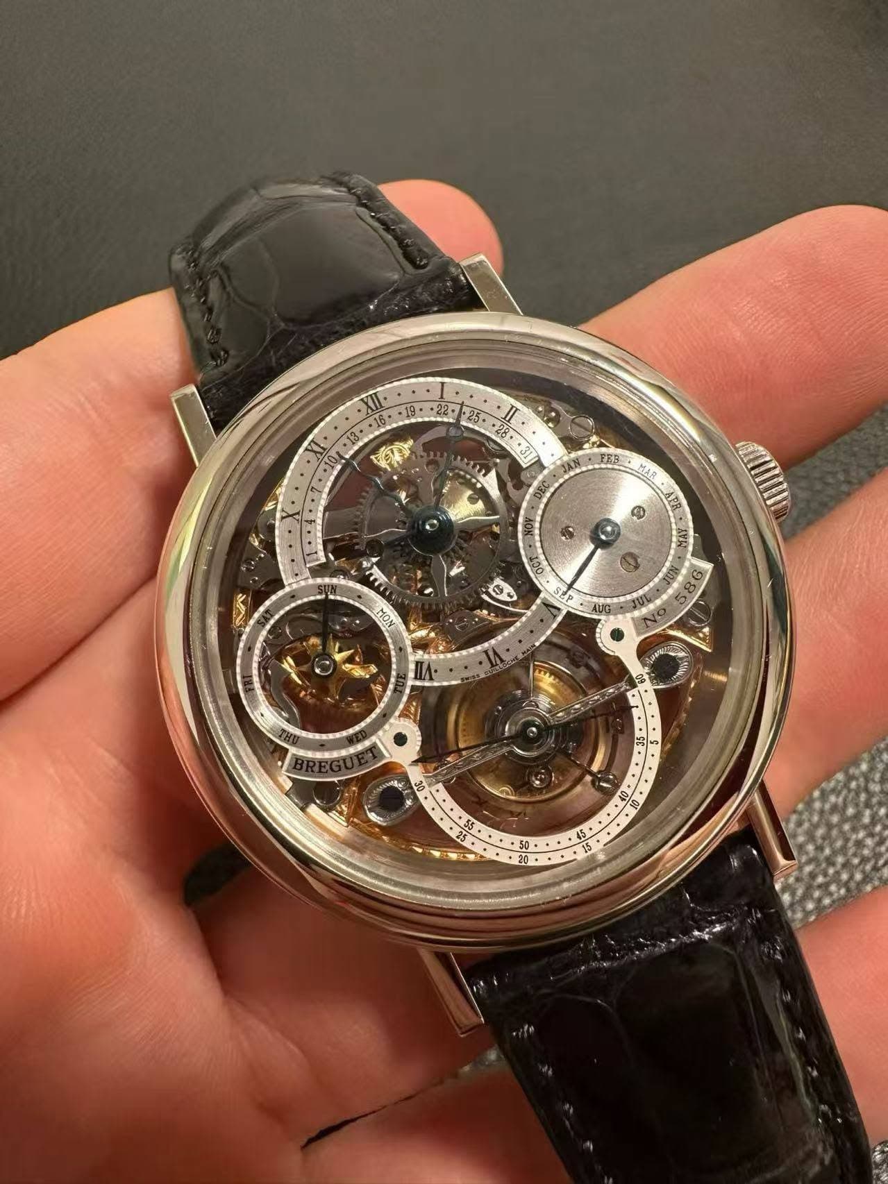 May be an image of wrist watch