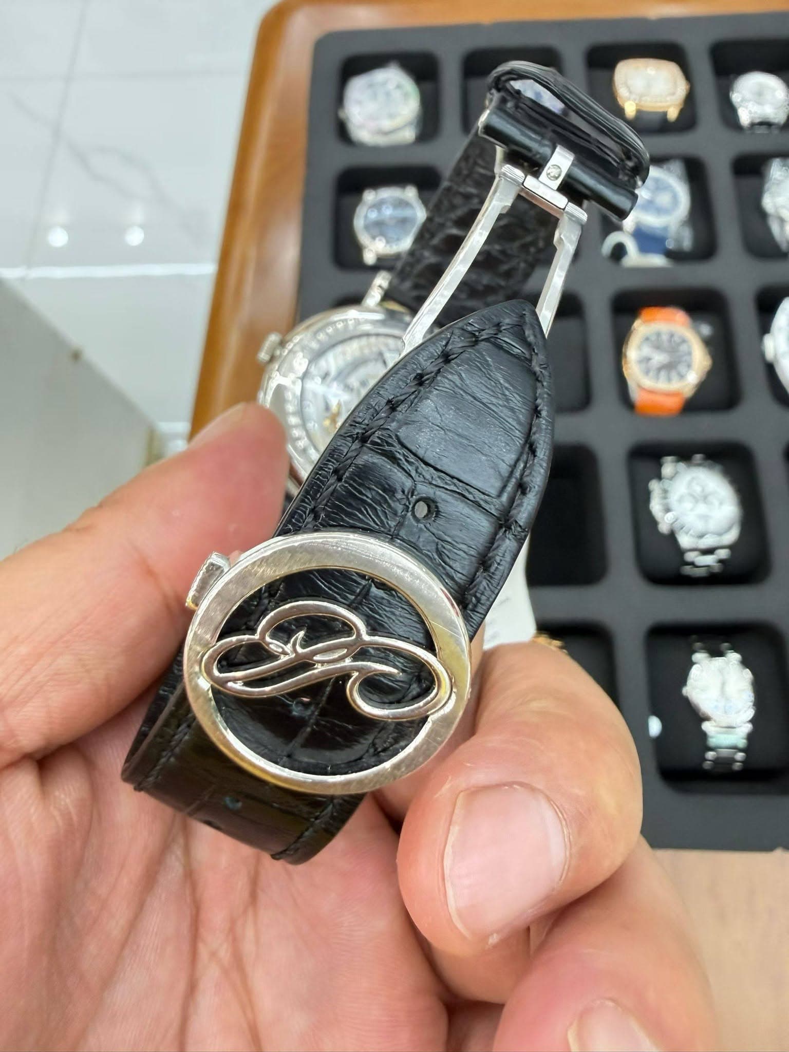 May be an image of wrist watch and text
